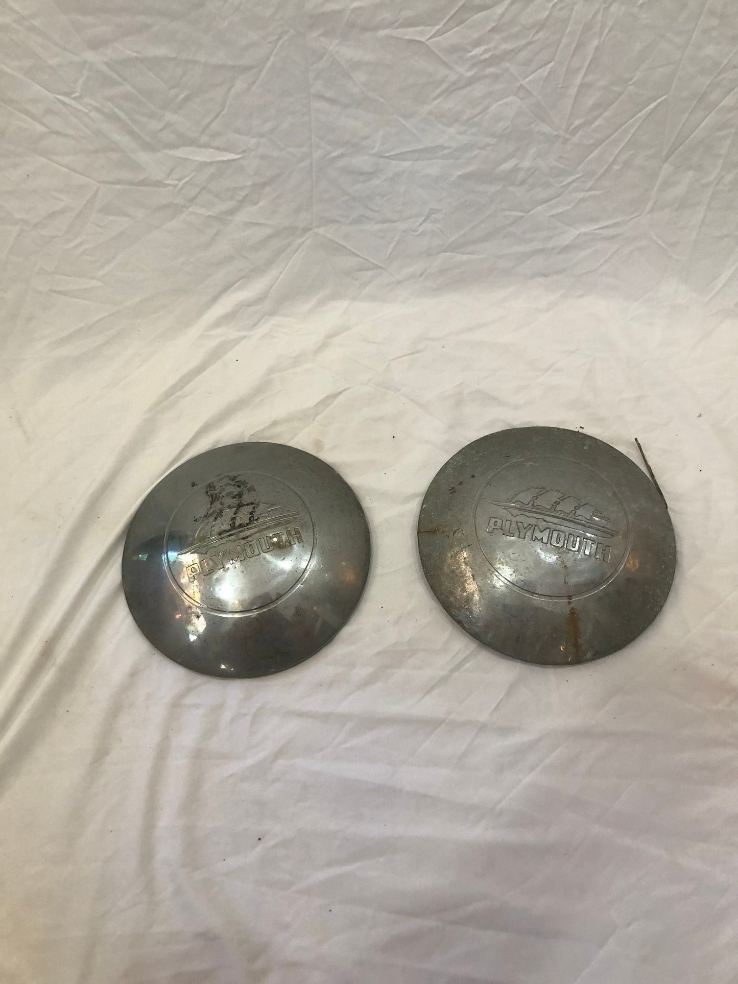 Pair of Vintage Plymouth Hub Caps
