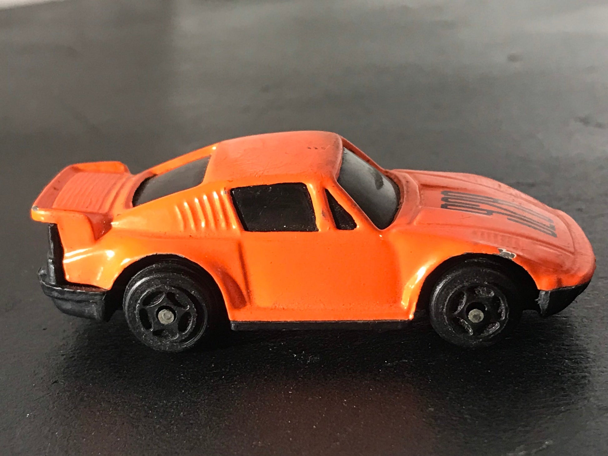 Vintage 928 Orange Toy Car