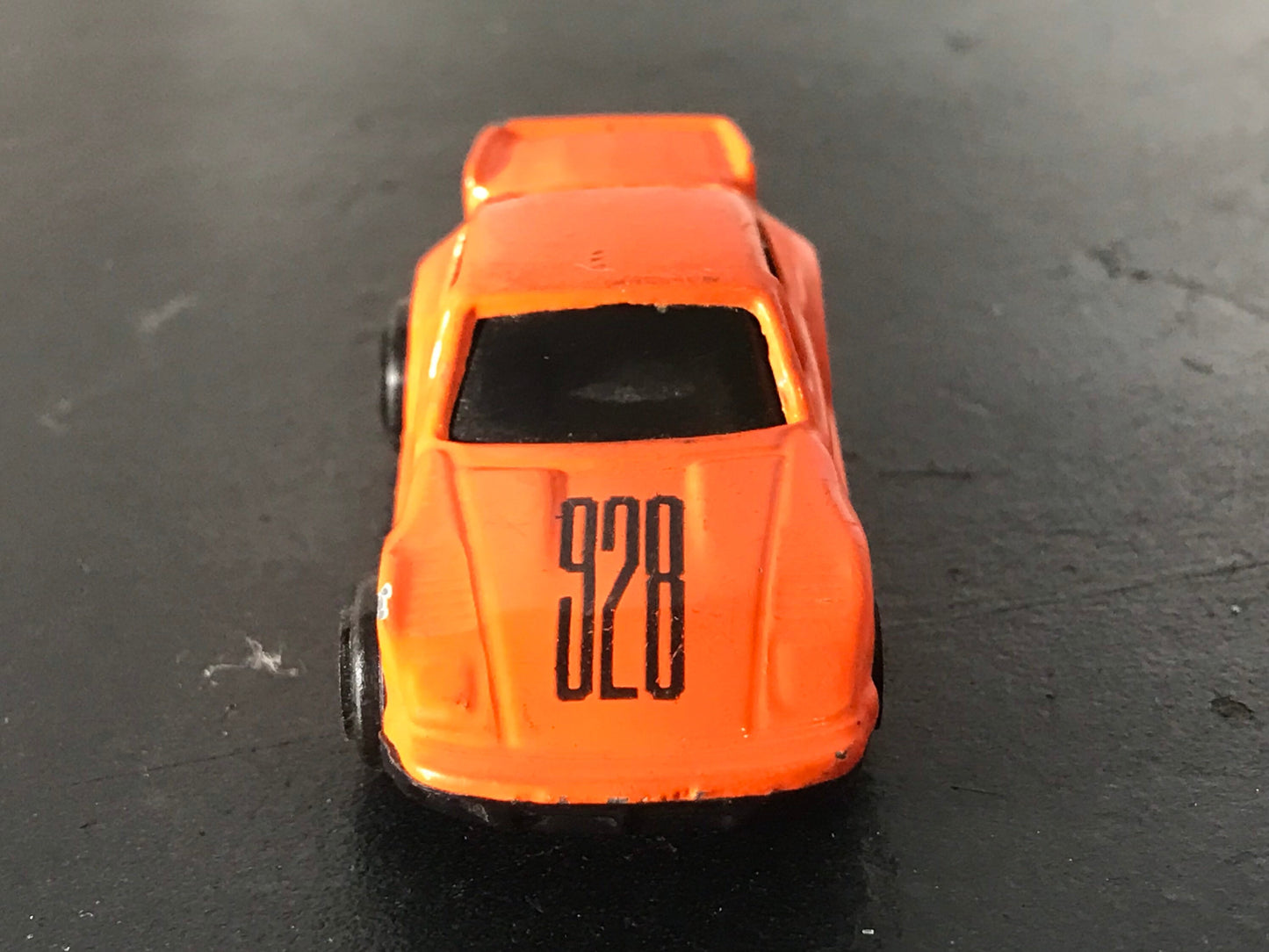 Vintage 928 Orange Toy Car