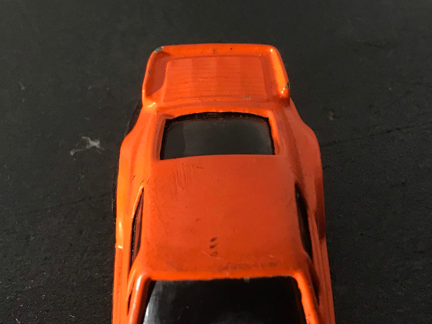 Vintage 928 Orange Toy Car