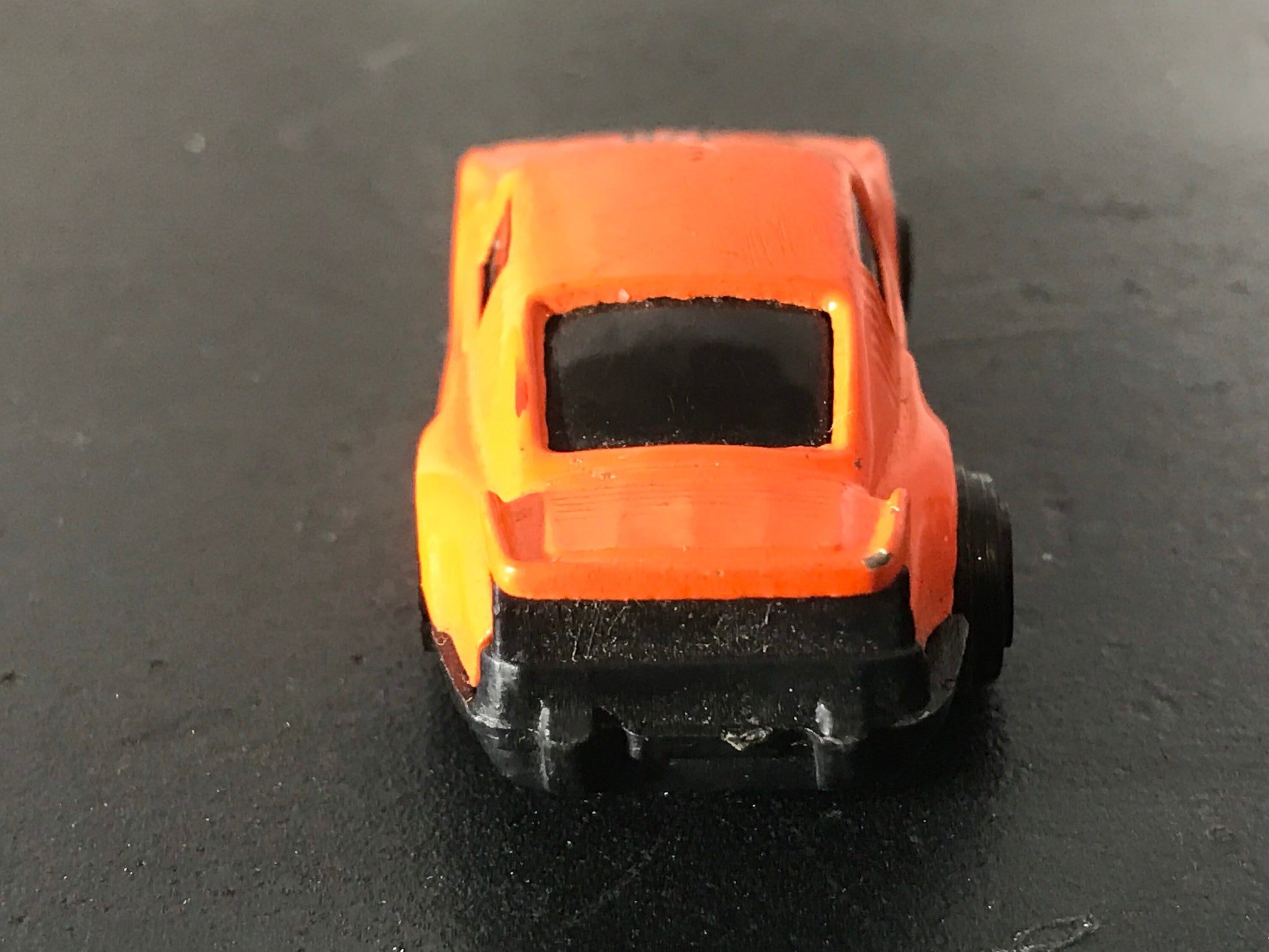 Vintage 928 Orange Toy Car