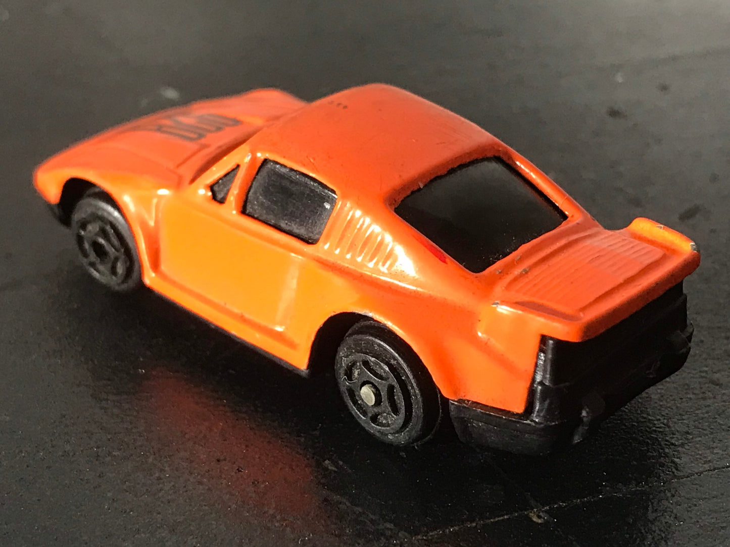 Vintage 928 Orange Toy Car