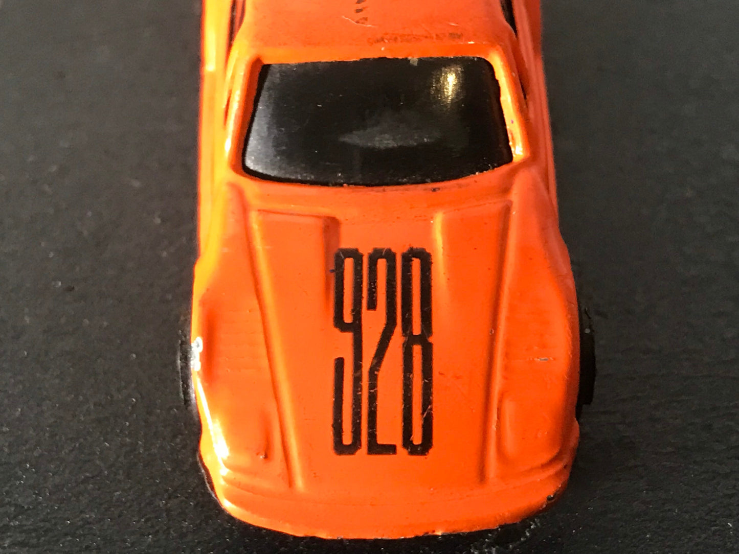 Vintage 928 Orange Toy Car