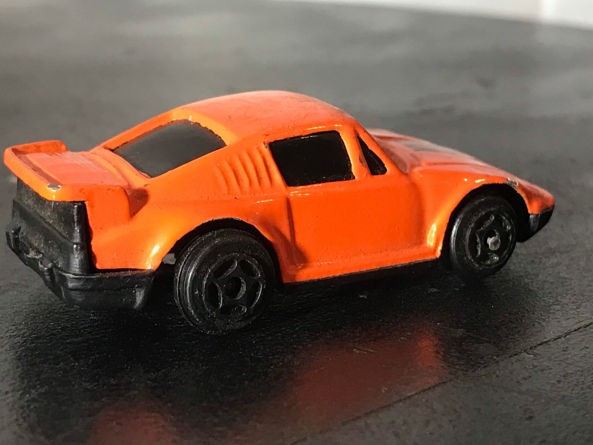 Vintage 928 Orange Toy Car