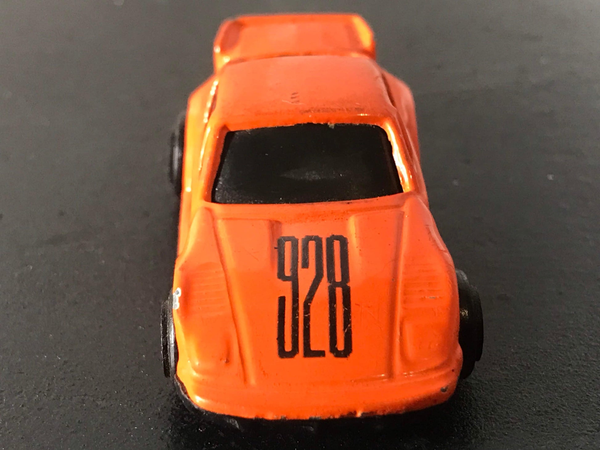 Vintage 928 Orange Toy Car