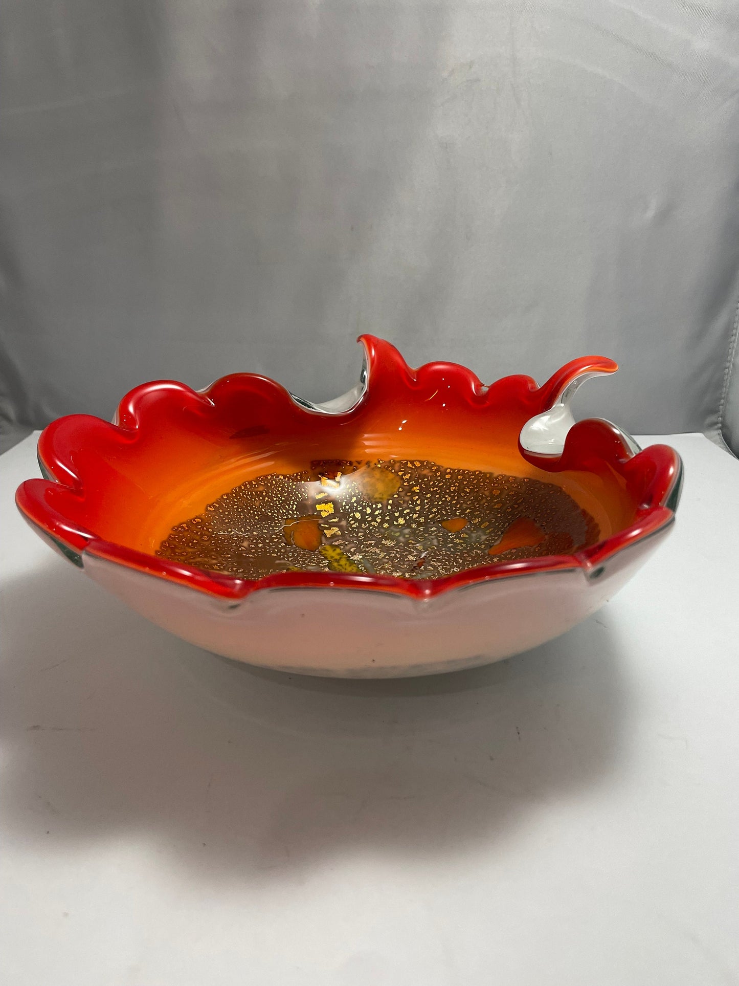 Mid Century Alfredo Barbini Venetian glass bowl, vibrant orange w/gold flecks throughout.