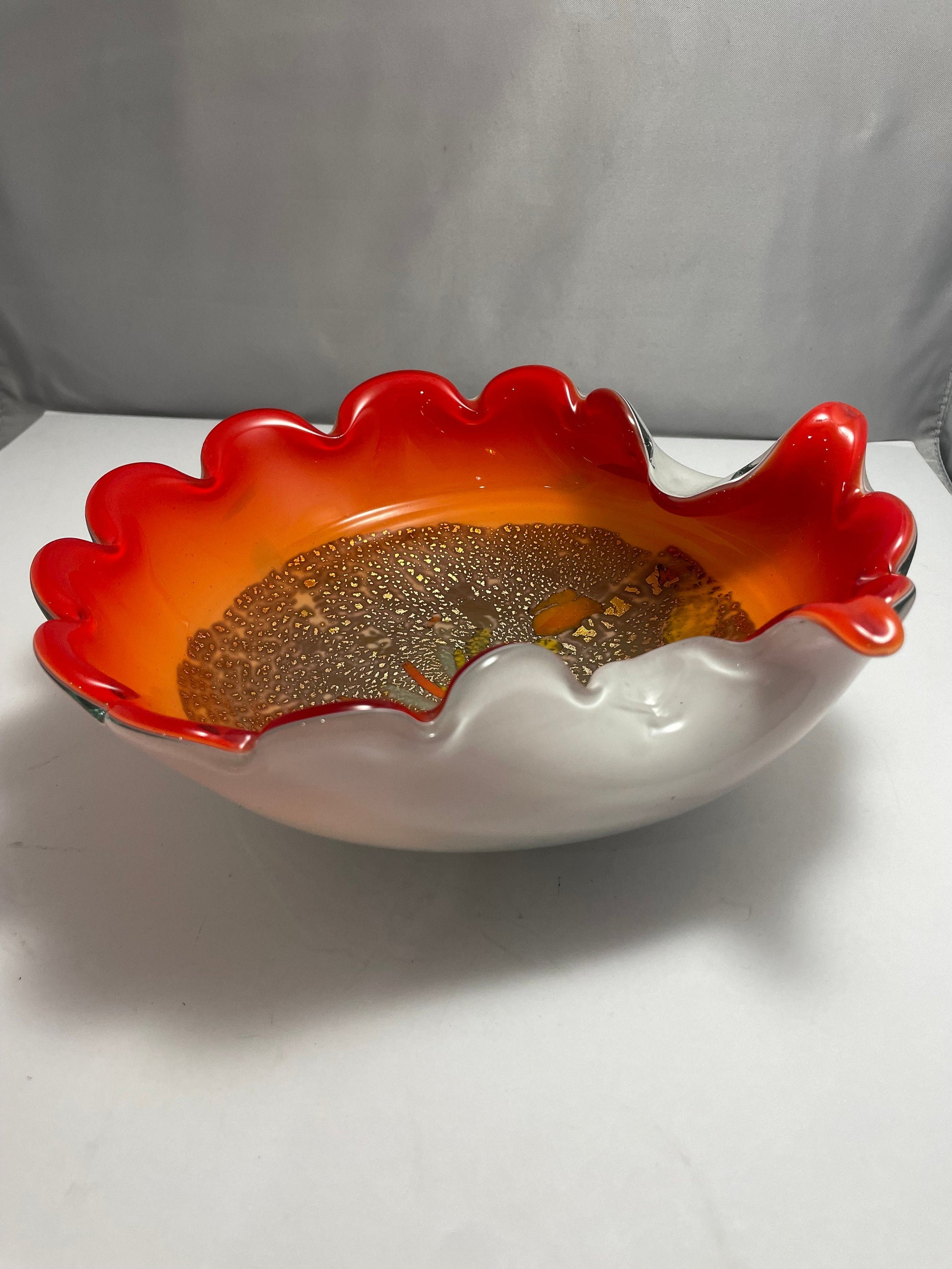 Mid Century Alfredo Barbini Venetian glass bowl, vibrant orange w/gold flecks throughout.