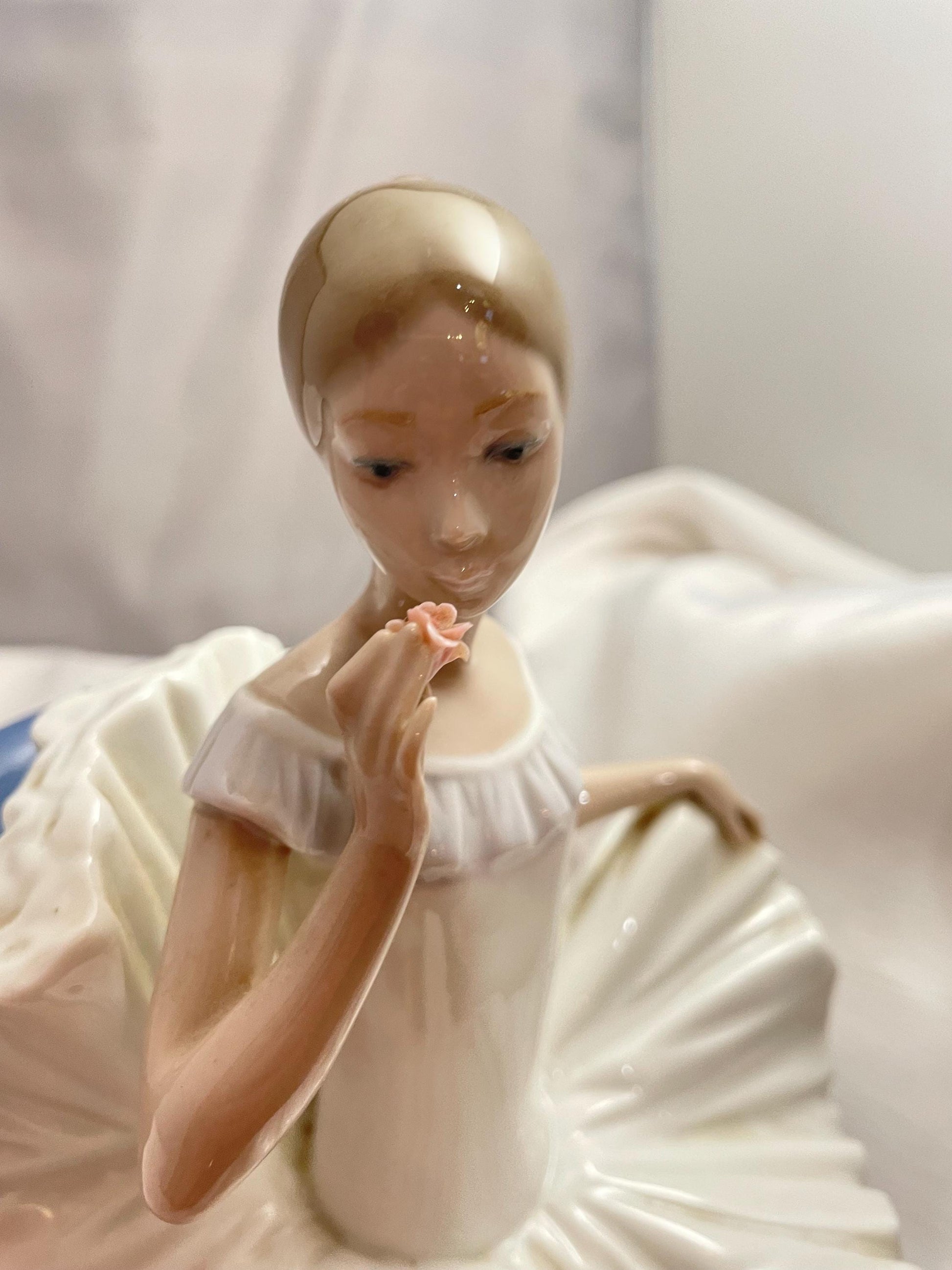 1983 Large Porcelain Lladro sitting Ballerina/Blue chair.