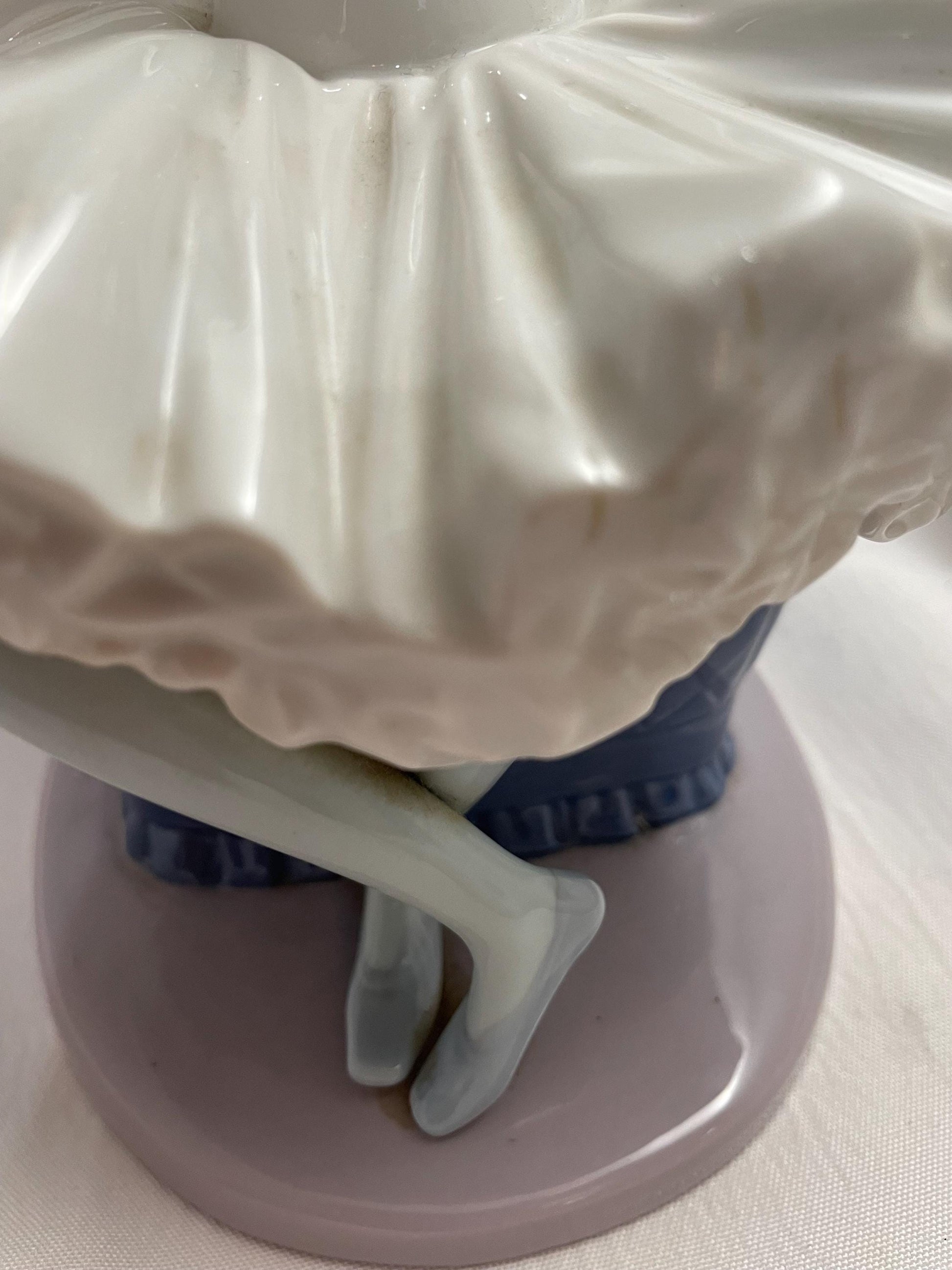 1983 Large Porcelain Lladro sitting Ballerina/Blue chair.