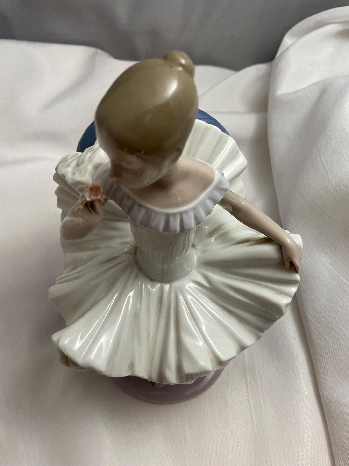1983 Large Porcelain Lladro sitting Ballerina/Blue chair.