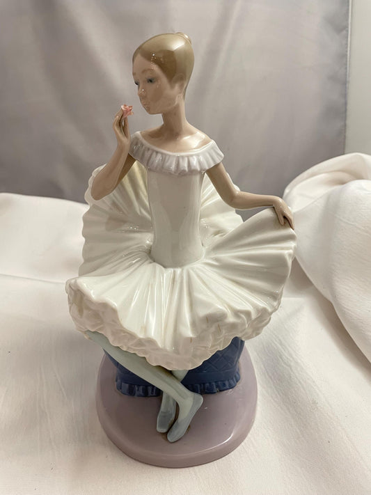 1983 Large Porcelain Lladro sitting Ballerina/Blue chair.