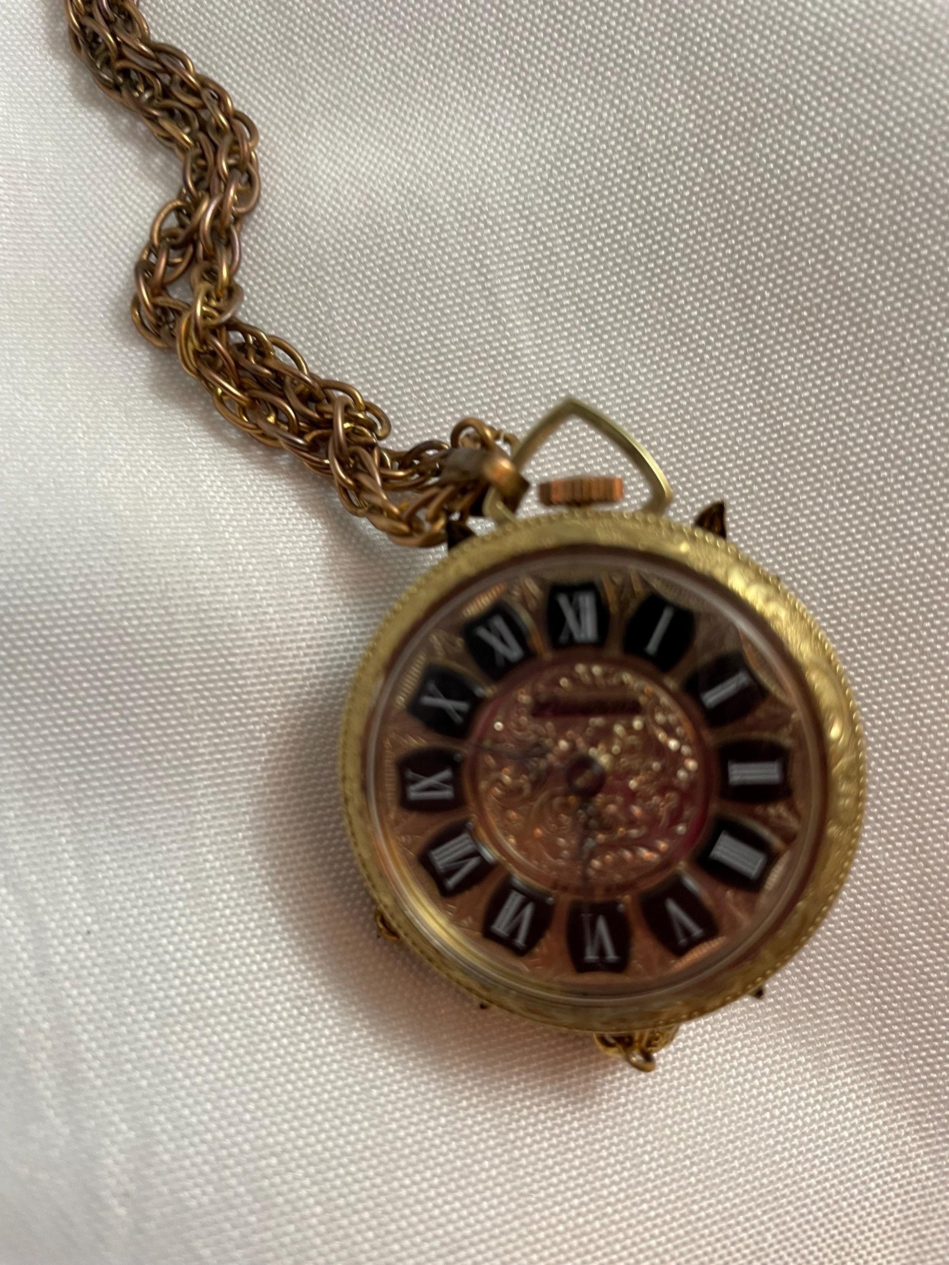 Vintage Lucerne Heritage Pendant Watch/Necklace Cameo look. In working condition.