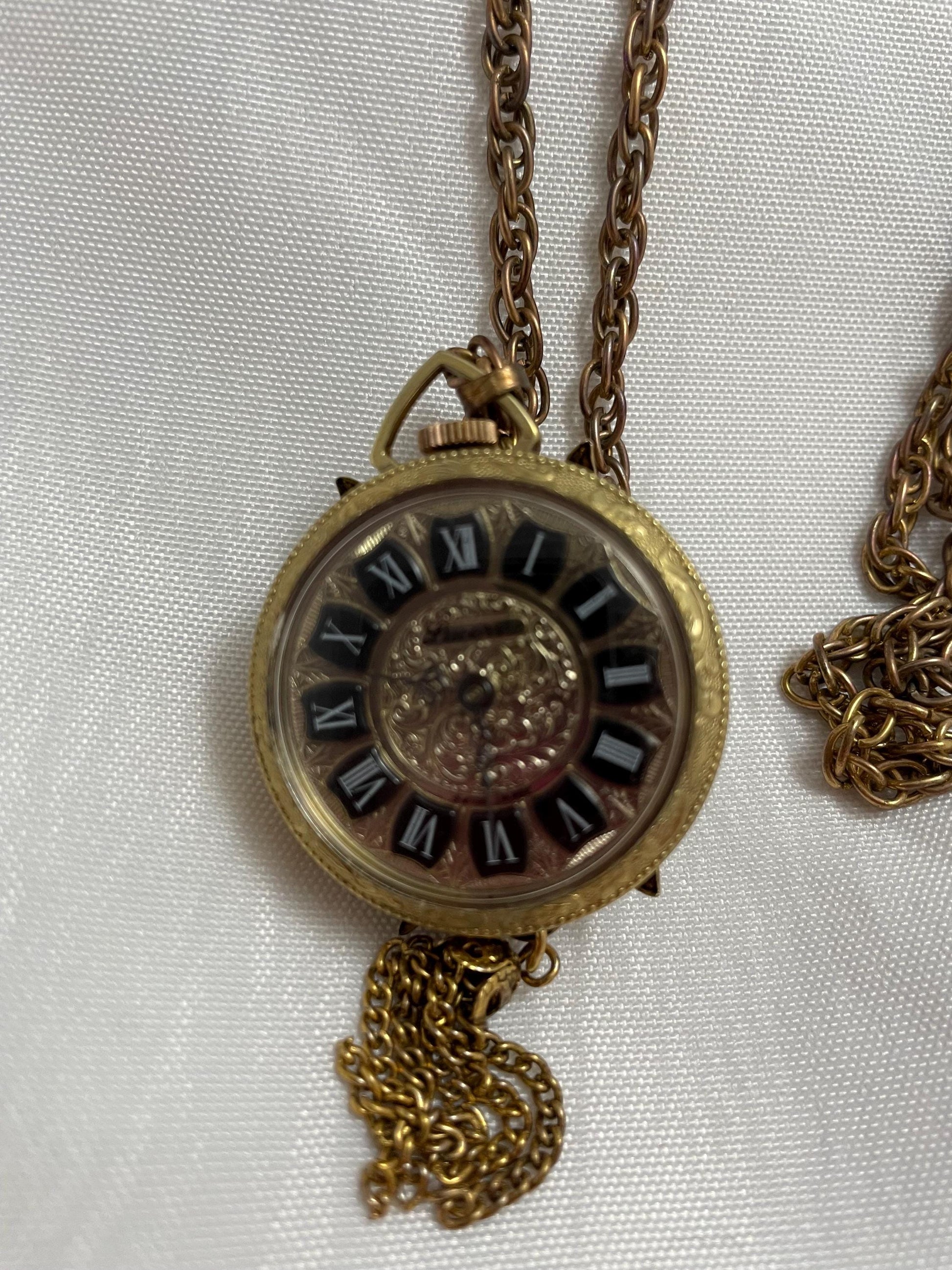 Vintage Lucerne Heritage Pendant Watch/Necklace Cameo look. In working condition.