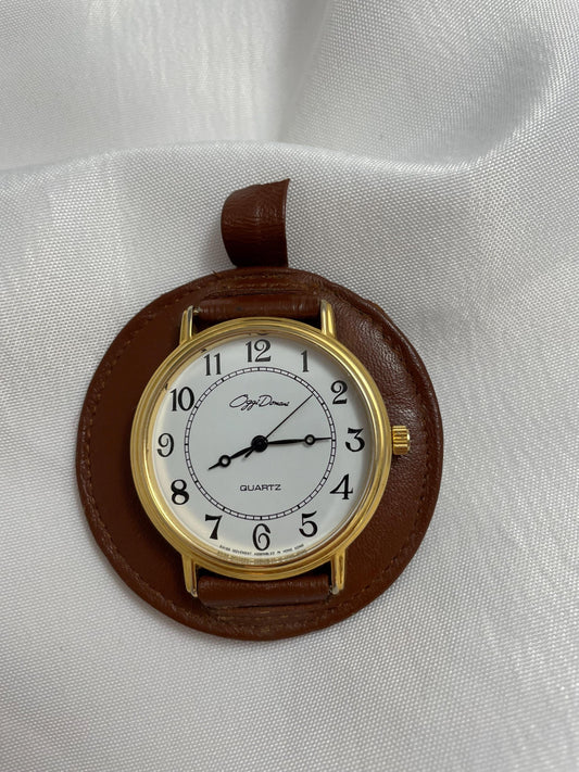 Vintage Oggi Domani Accessory wrist watch. gold. Genuine Cowhide Leather mounted. unable to determine if it works.