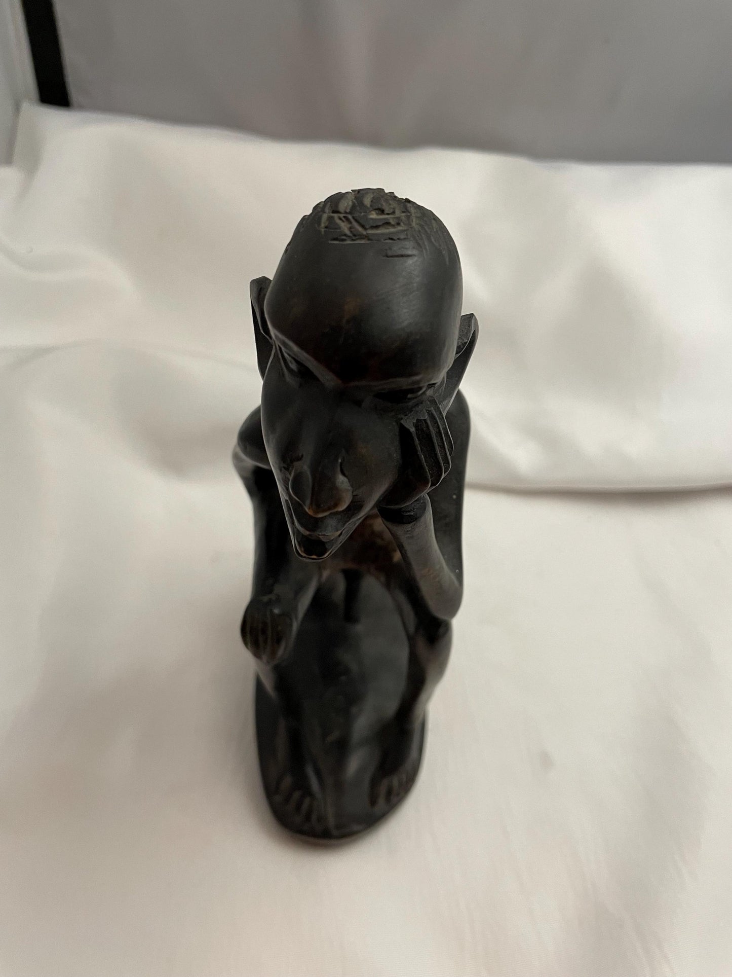 african Handcarved sitting Man