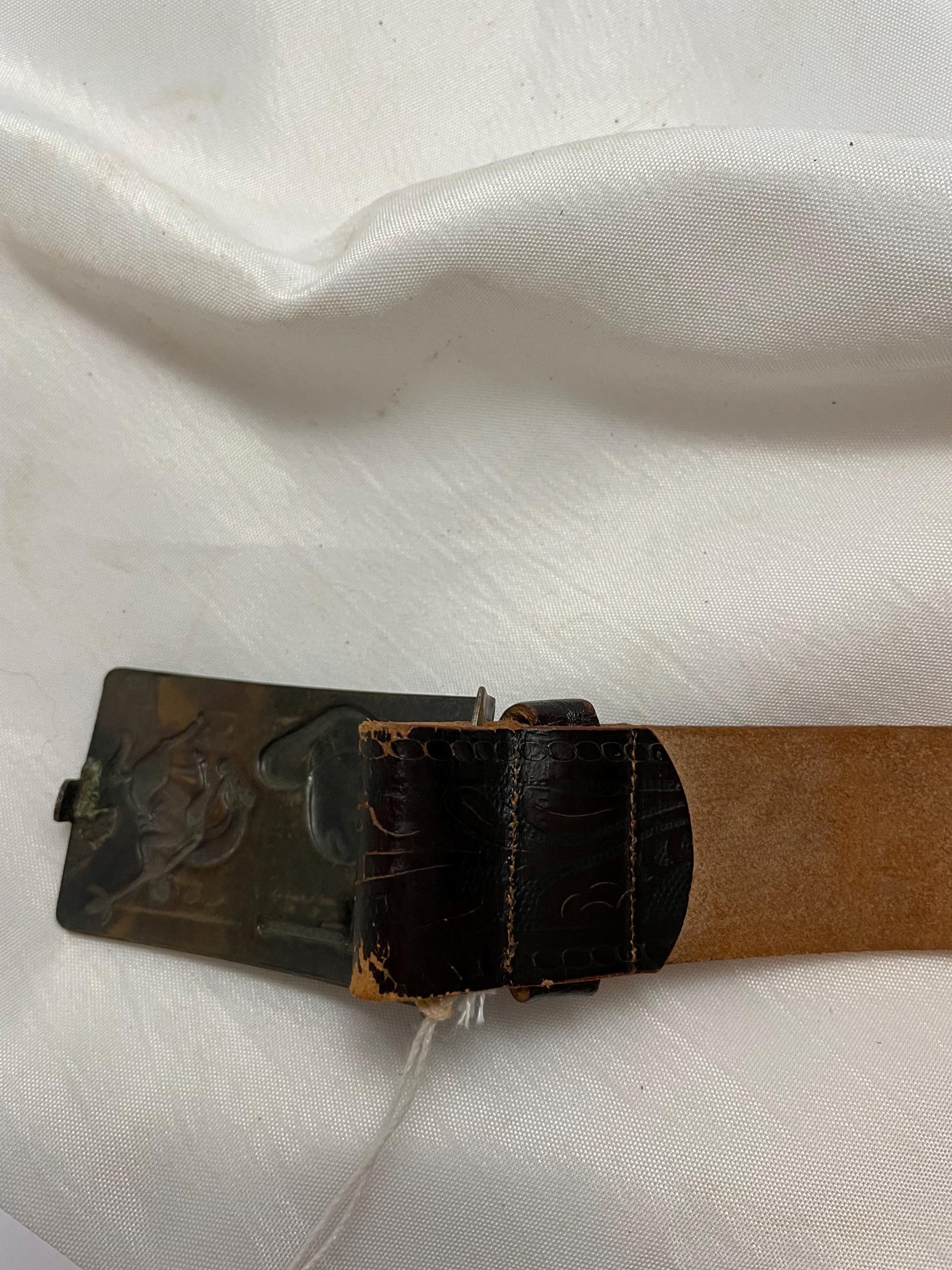 Old Vintage 1950’s small Leather Cowboy Belt w/ Buckle. Great pressed Back on buckle.