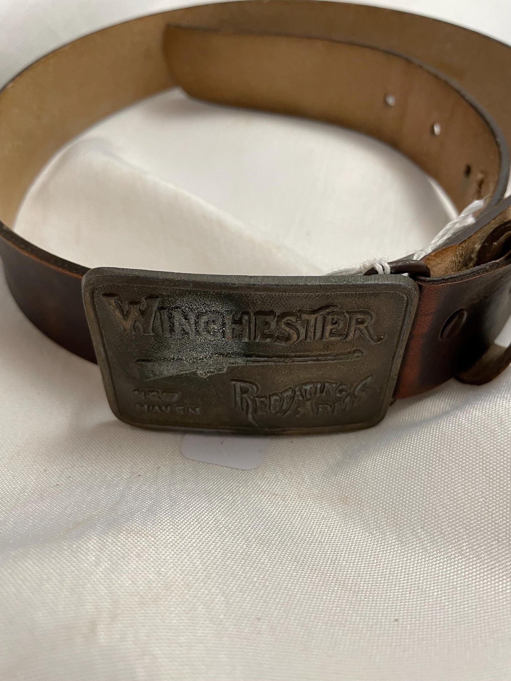 Winchester Repeating Firearms Firearms Belt Buckle. Small Leather belt.