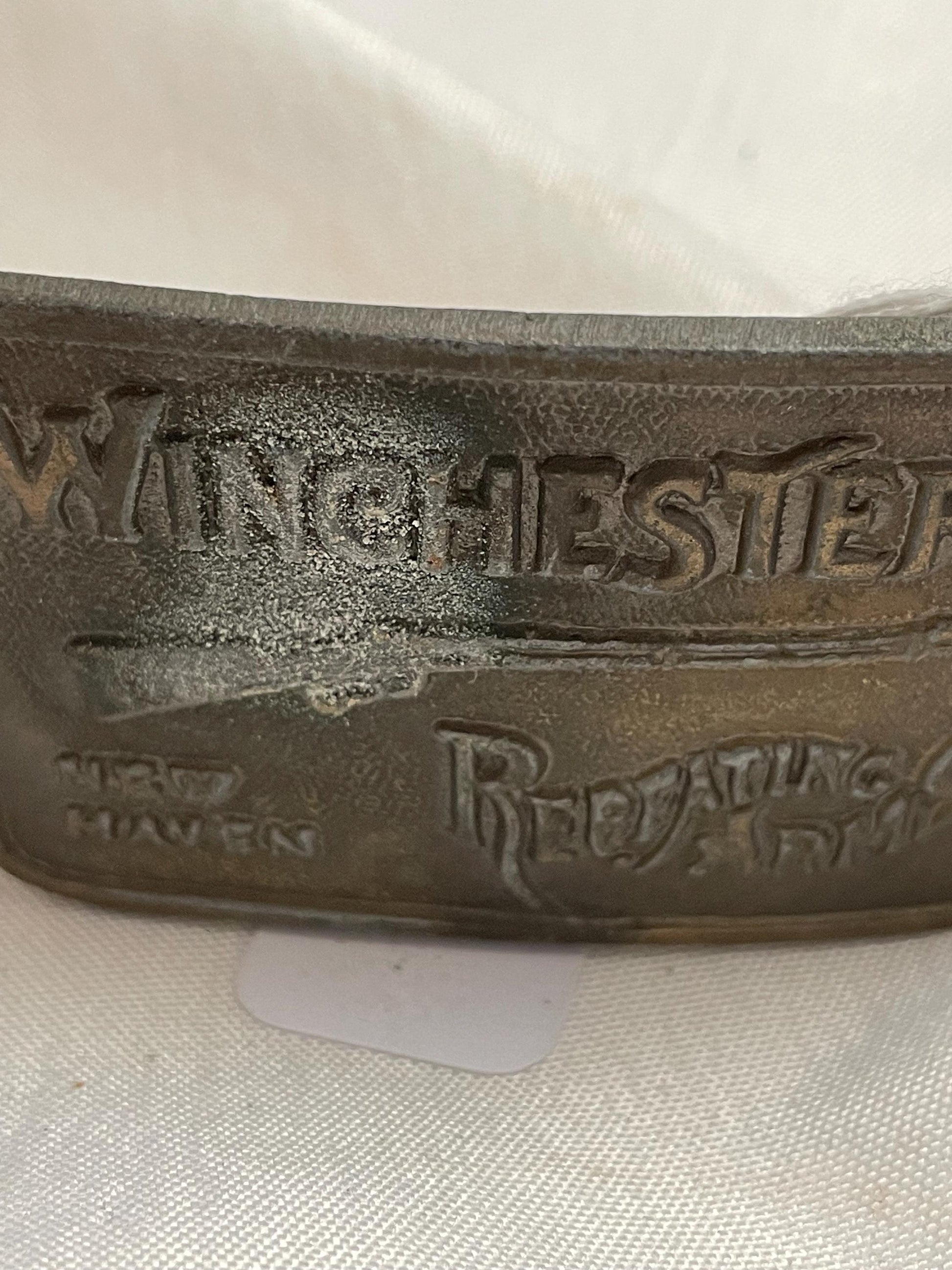 Winchester Repeating Firearms Firearms Belt Buckle. Small Leather belt.