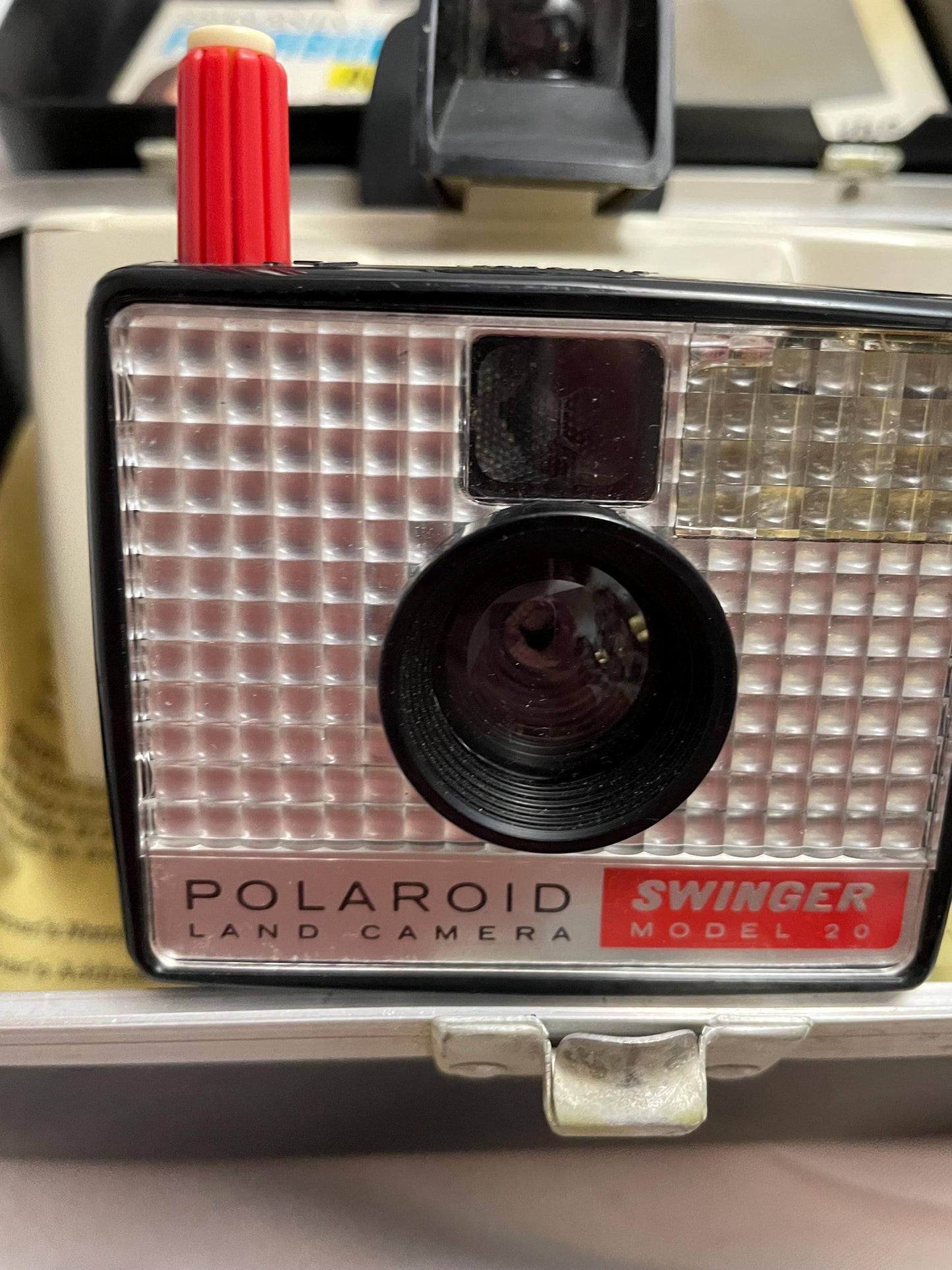 Vintage Polaroid Swinger model 20 Land camera w/ case, instructions and extra flashbulbs.