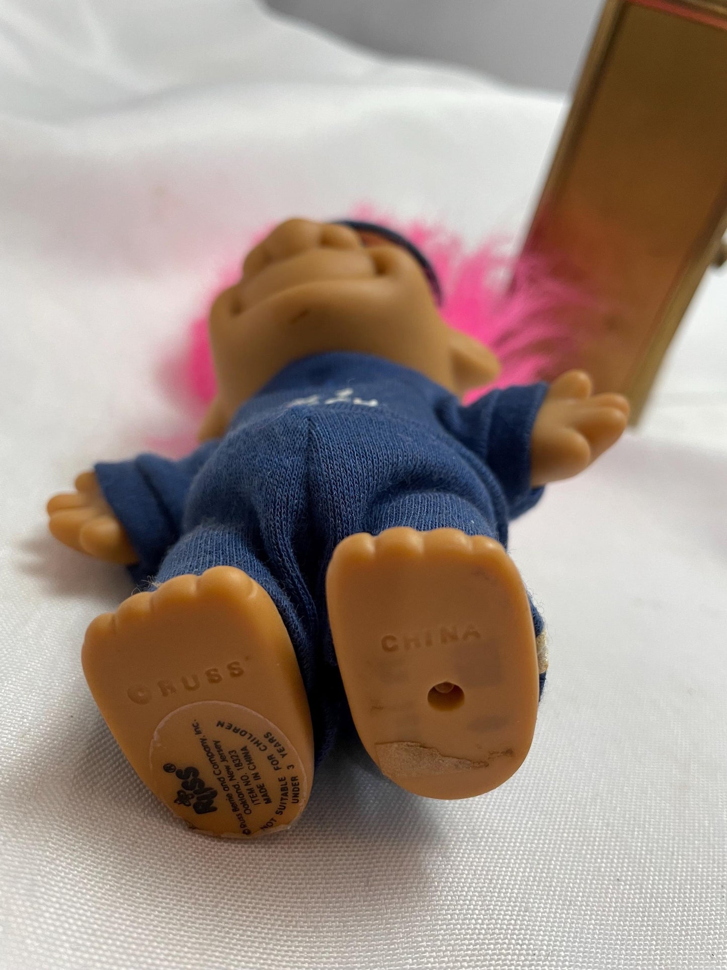 Russ Berrie #1 Coach w/track suit Troll Doll. Pink hair. 4 1/2”.