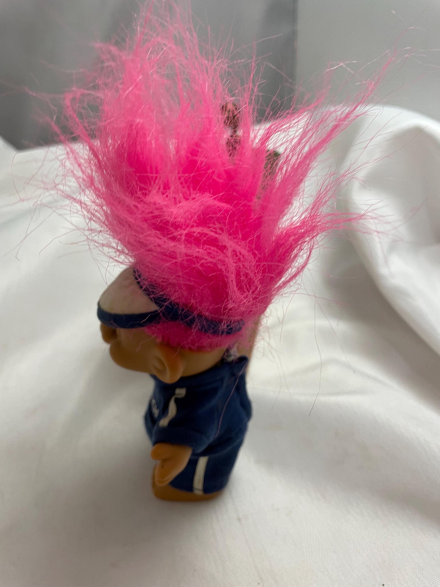 Russ Berrie #1 Coach w/track suit Troll Doll. Pink hair. 4 1/2”.