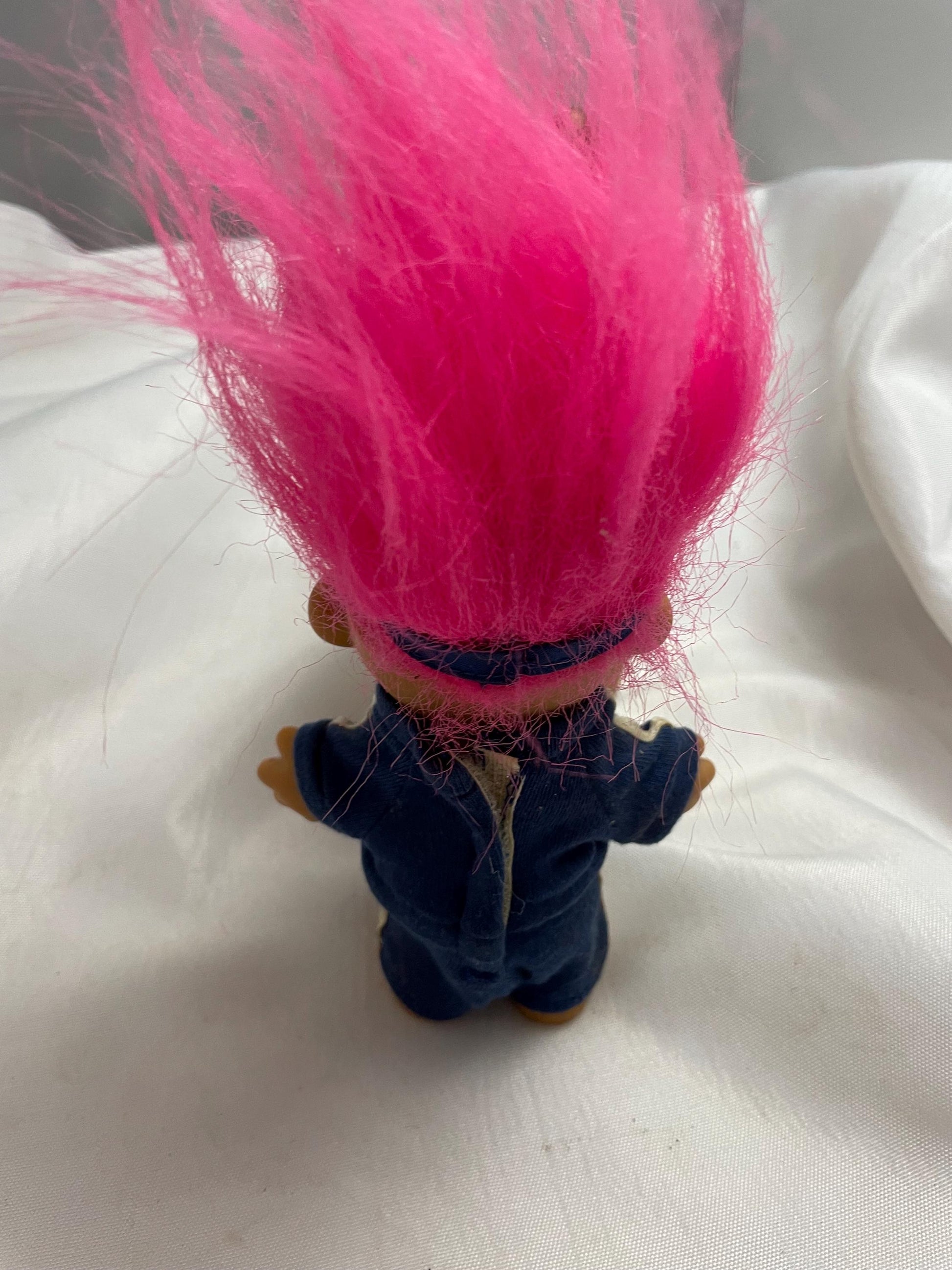 Russ Berrie #1 Coach w/track suit Troll Doll. Pink hair. 4 1/2”.