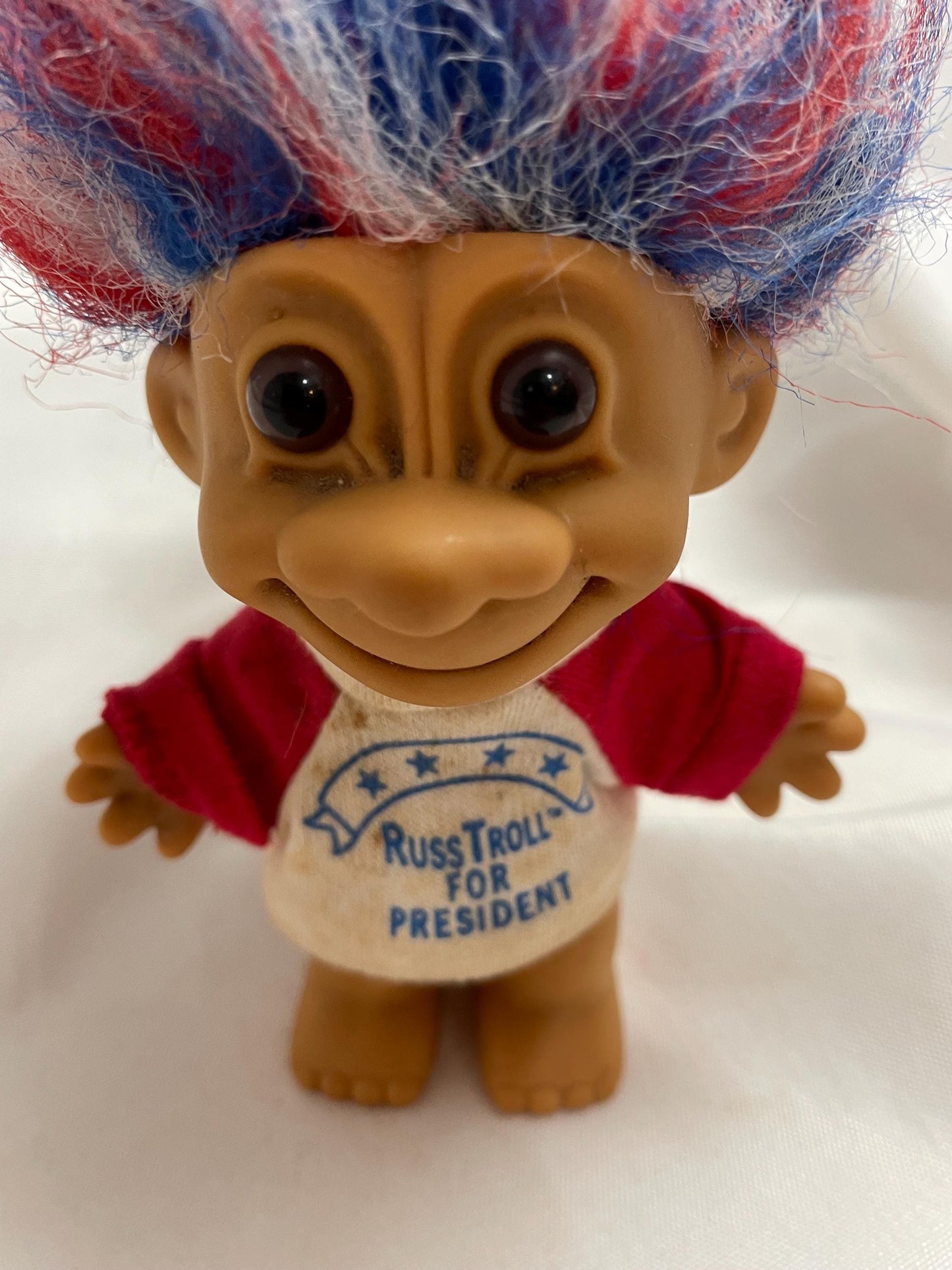 Vintage 1980’s Russ Troll For President doll. shirt is removable and washable. 41/2”. Red/ White and Blue hair.