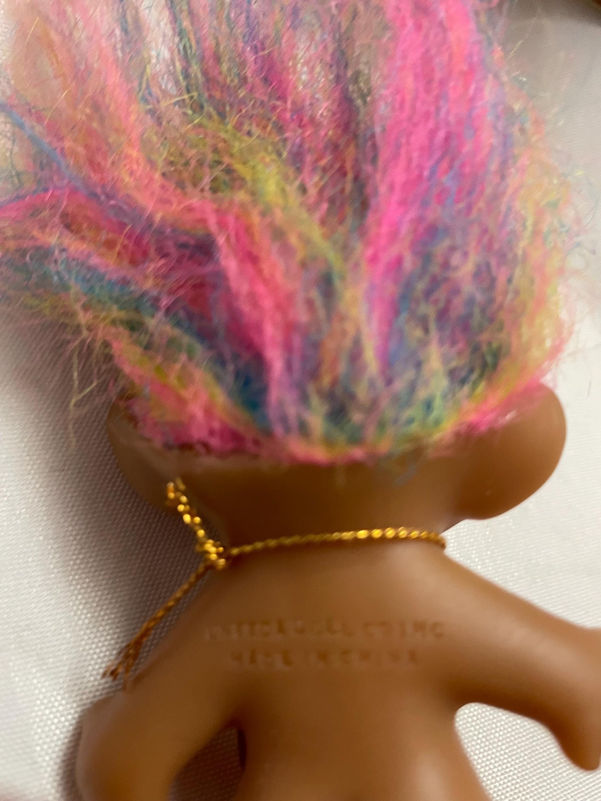 Vintage Uneeda Good Luck Wishnik Troll doll. 21/2”. Rainbow hair.