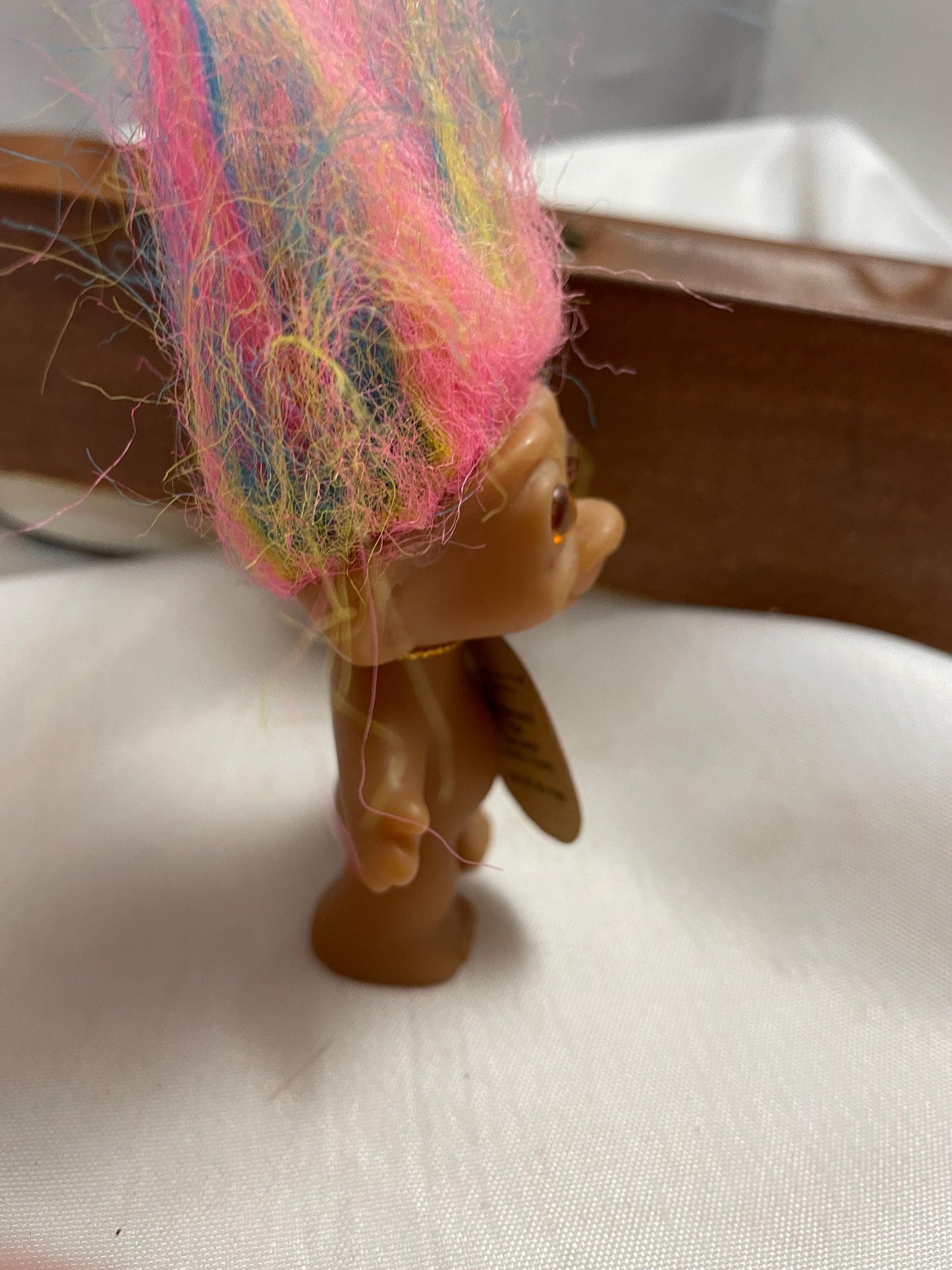 Vintage Uneeda Good Luck Wishnik Troll doll. 21/2”. Rainbow hair.