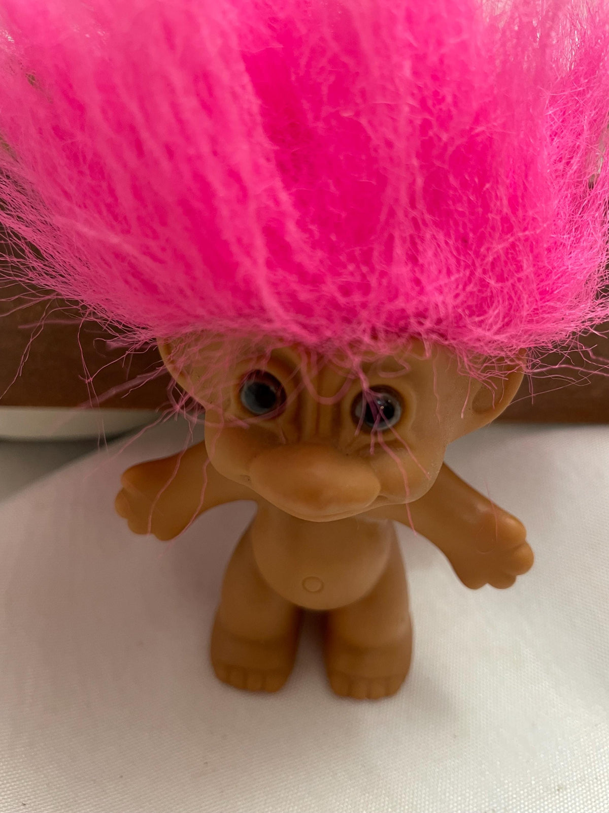 Vintage Russ Pink hair Troll doll. 3 1/2 “.
