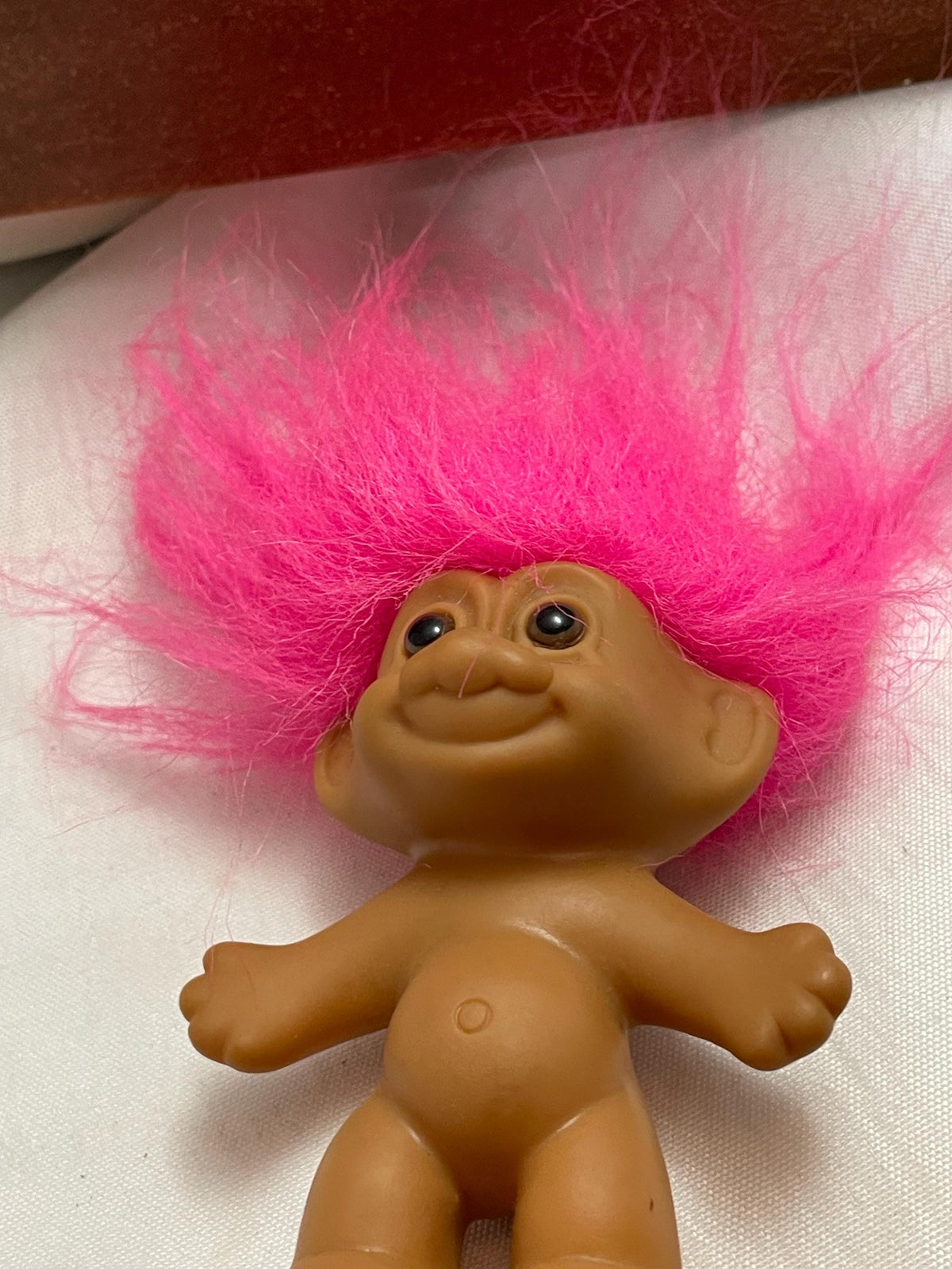 Vintage Russ Pink hair Troll doll. 3 1/2 “.