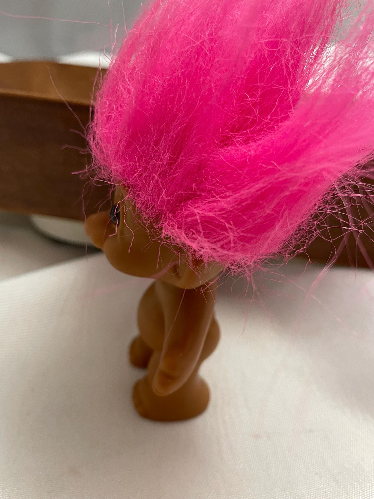 Vintage Russ Pink hair Troll doll. 3 1/2 “.