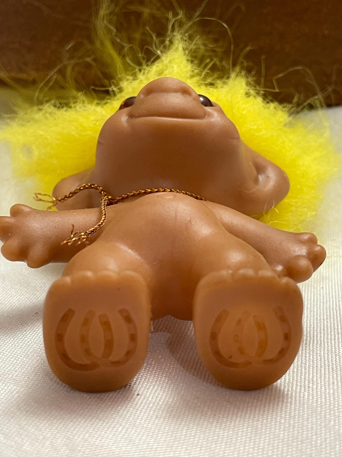 Vintage Russ Troll doll w/ Yellow hair. 3 1/2”.