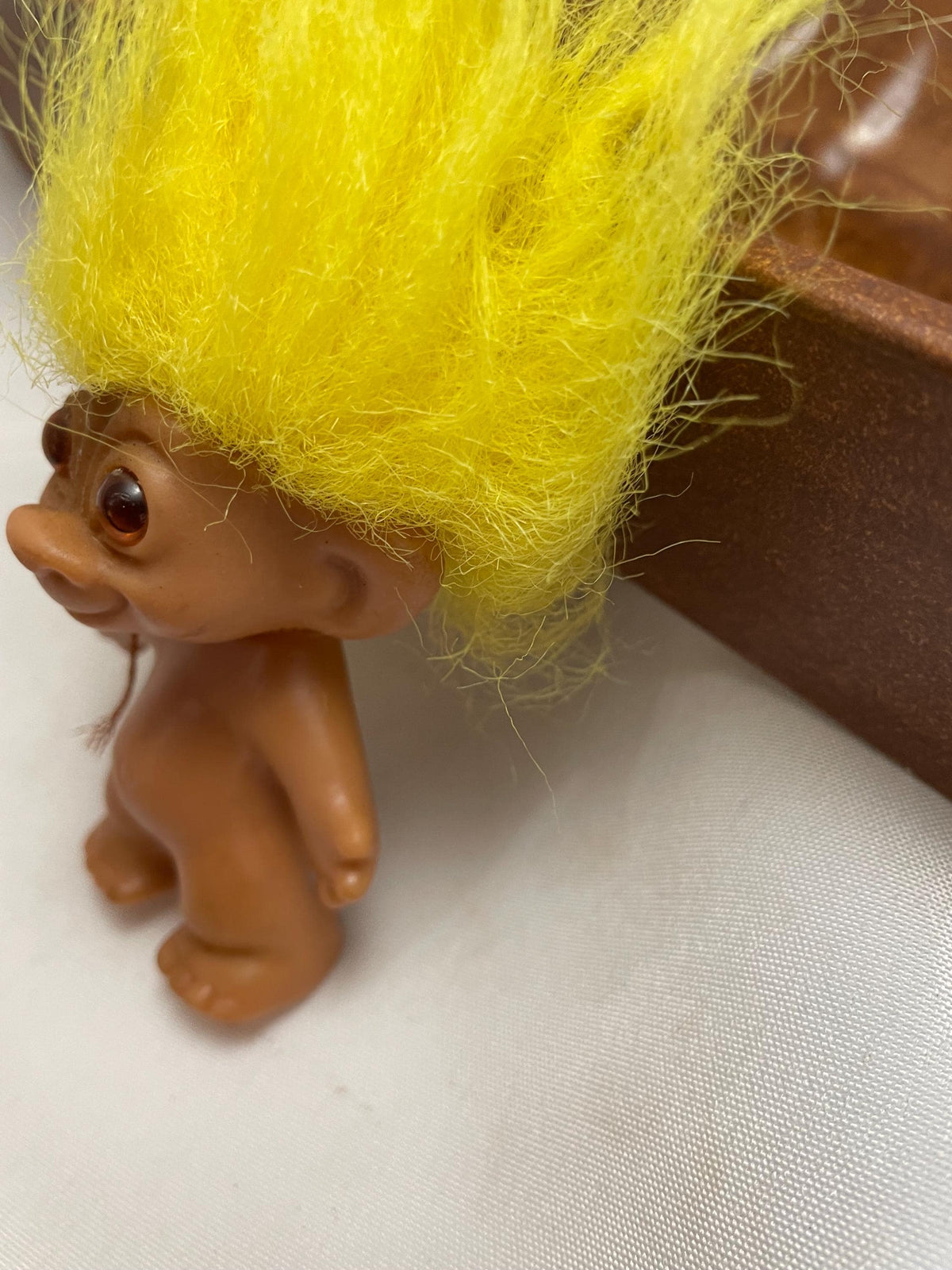 Vintage Russ Troll doll w/ Yellow hair. 3 1/2”.