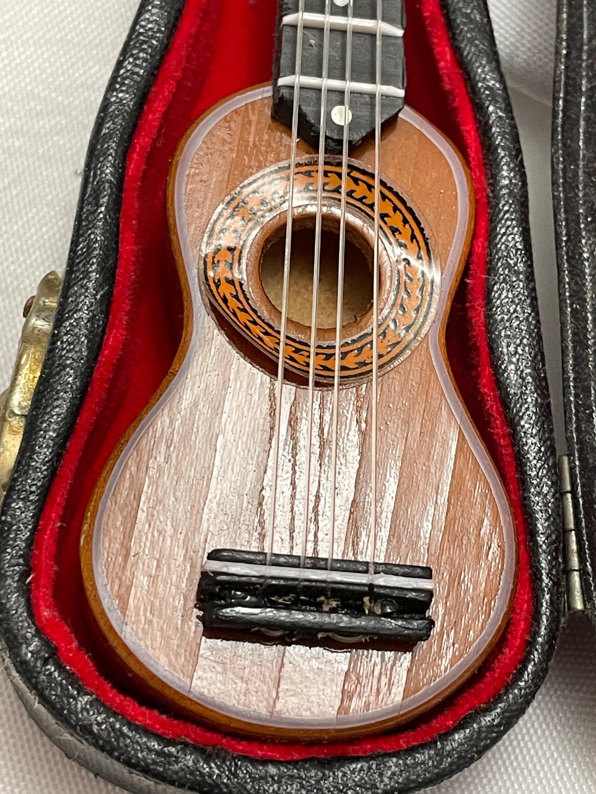 Miniature Replica of Acoustic Guitar in case.