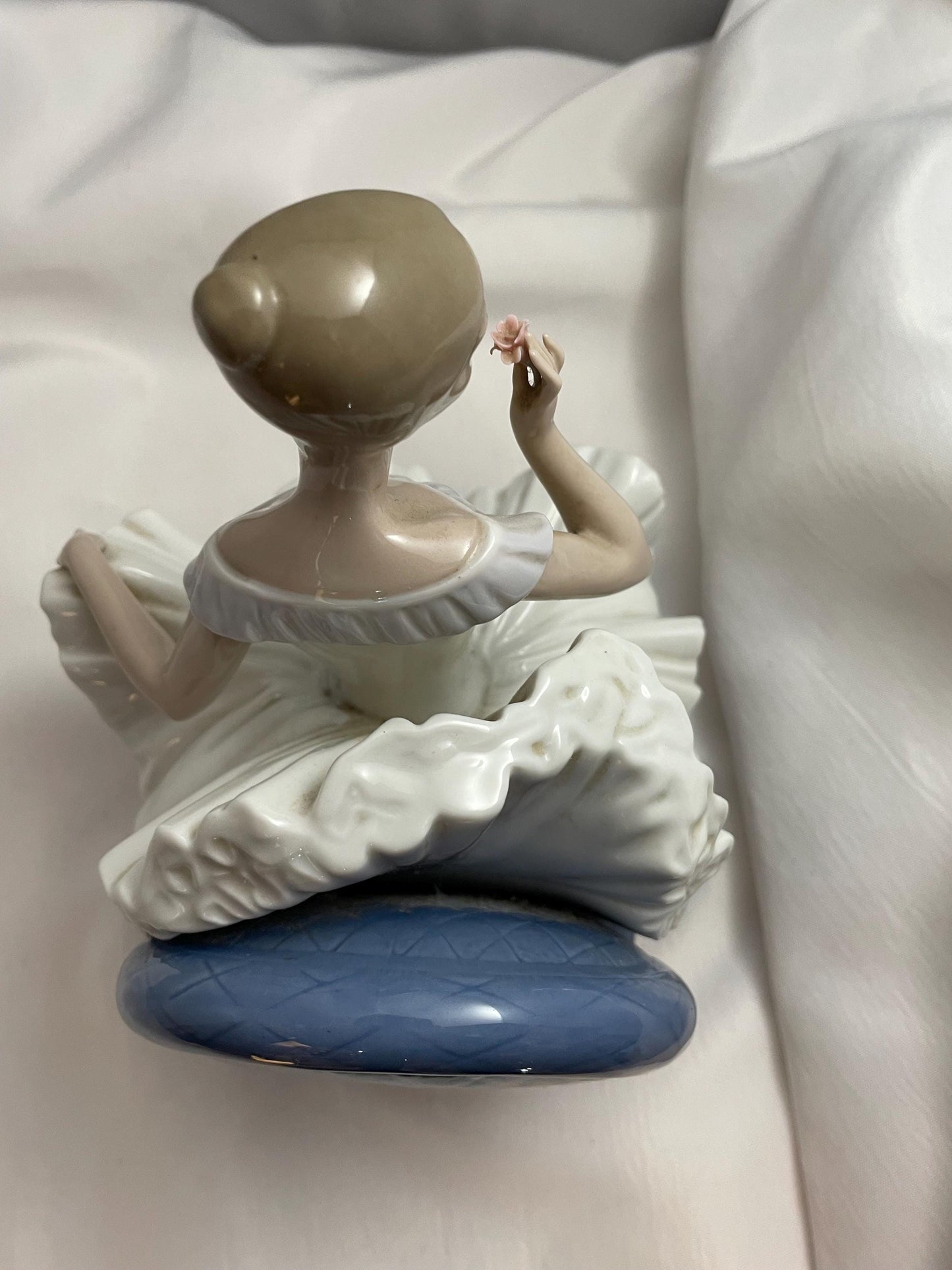 1983 Large Porcelain Lladro sitting Ballerina/Blue chair.