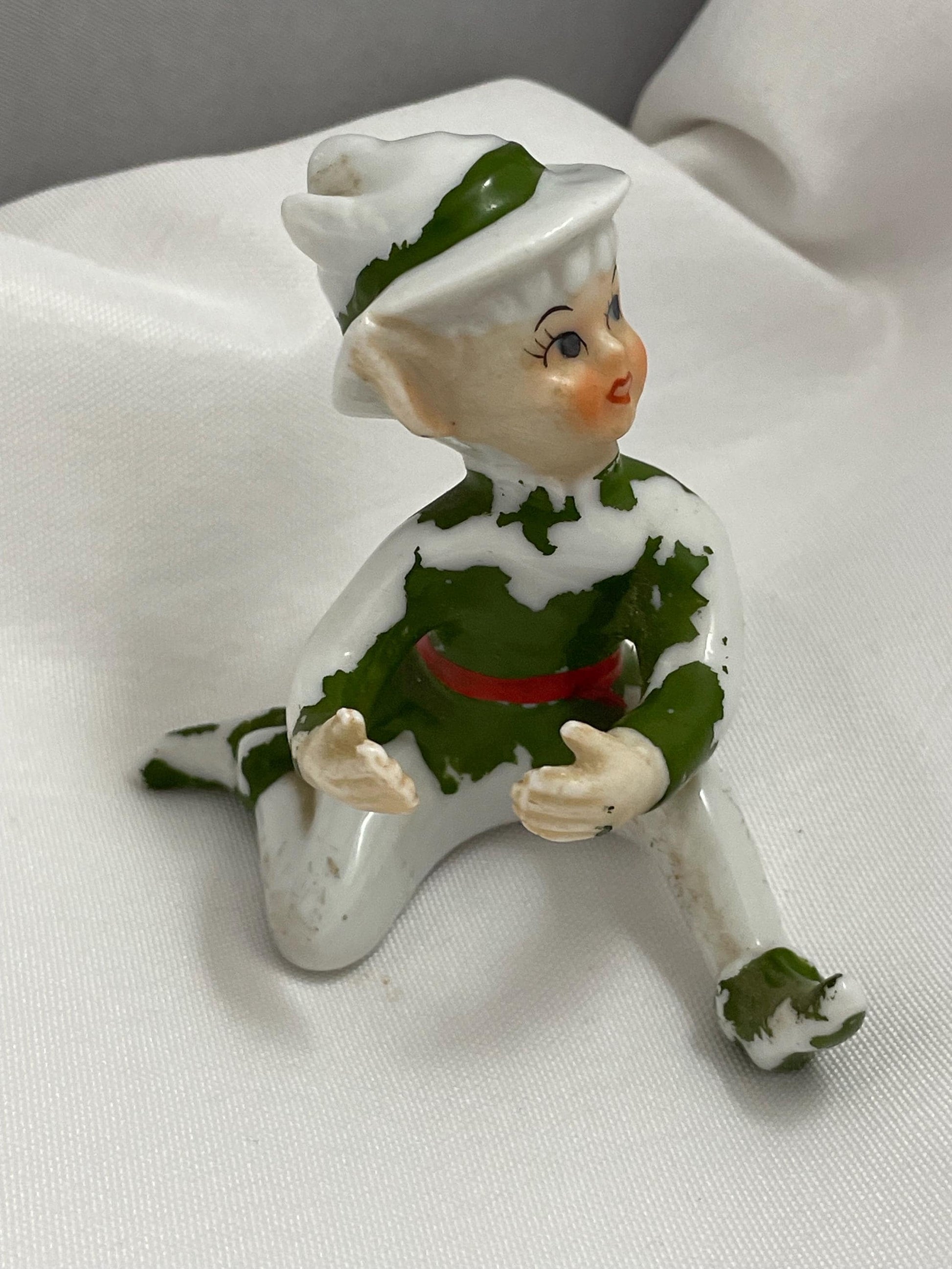 Vintage Christmas Pixie elves Figurine. Needs paint touch ups.