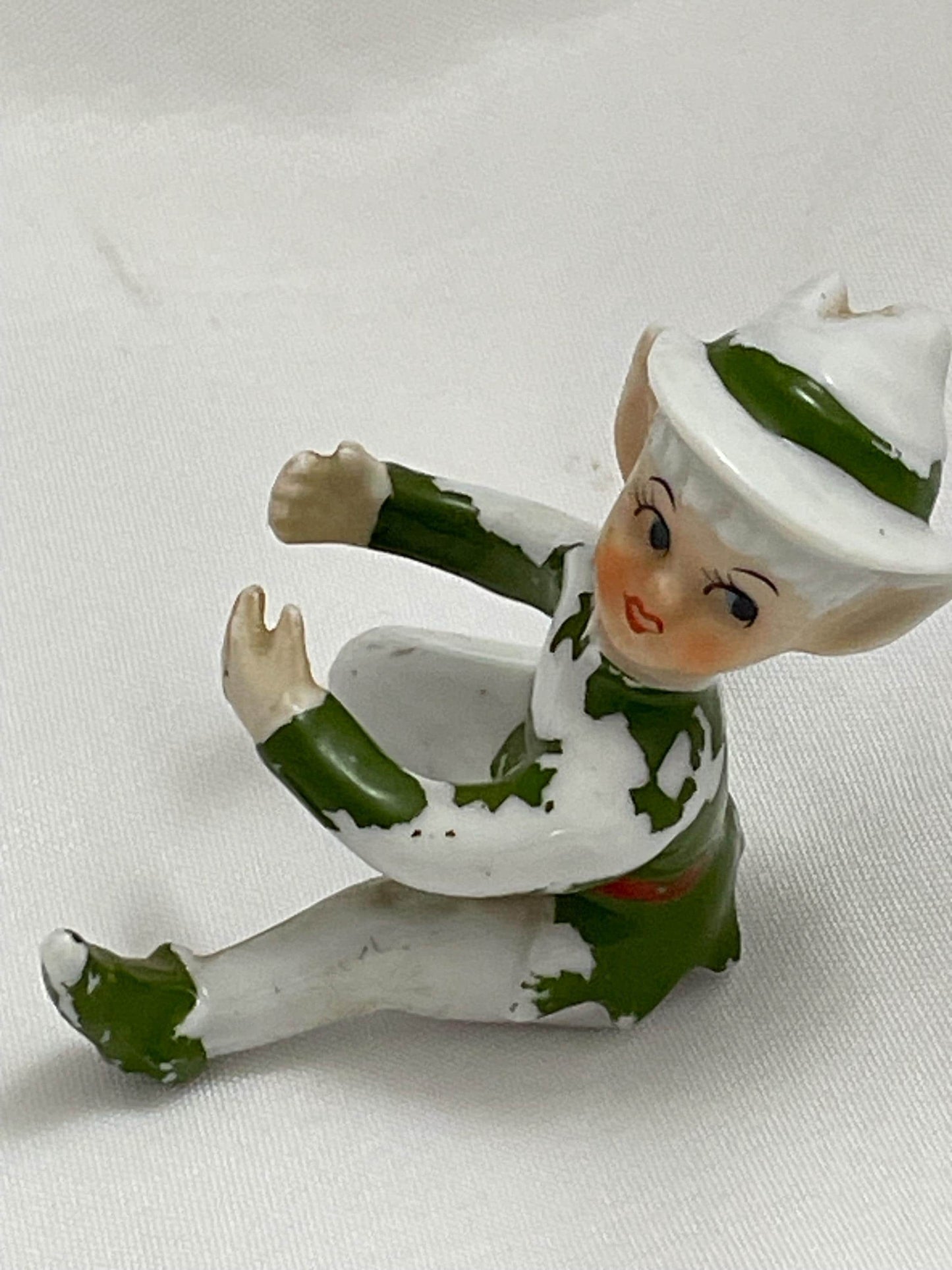 Vintage Christmas Pixie elves Figurine. Needs paint touch ups.