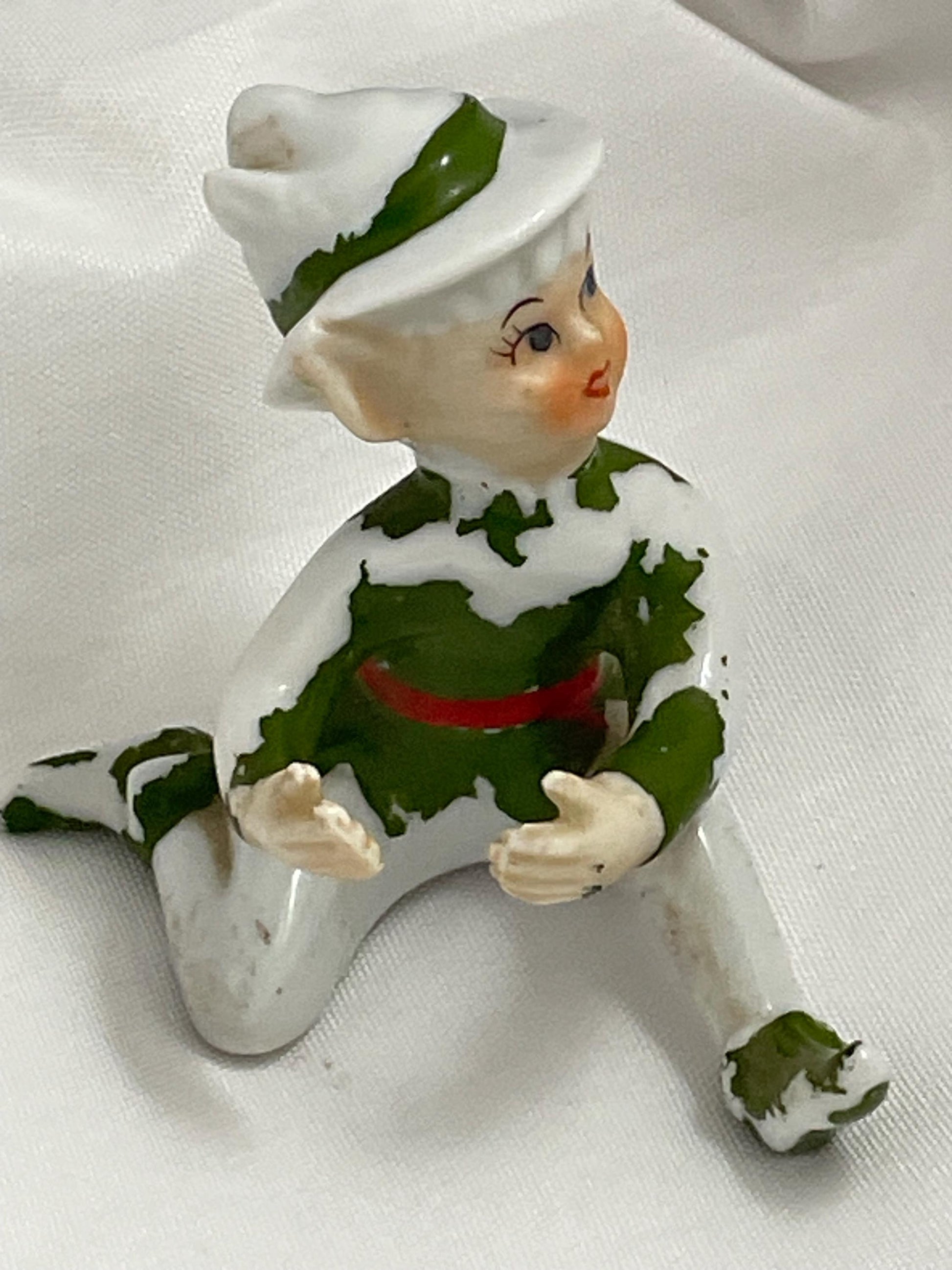 Vintage Christmas Pixie elves Figurine. Needs paint touch ups.