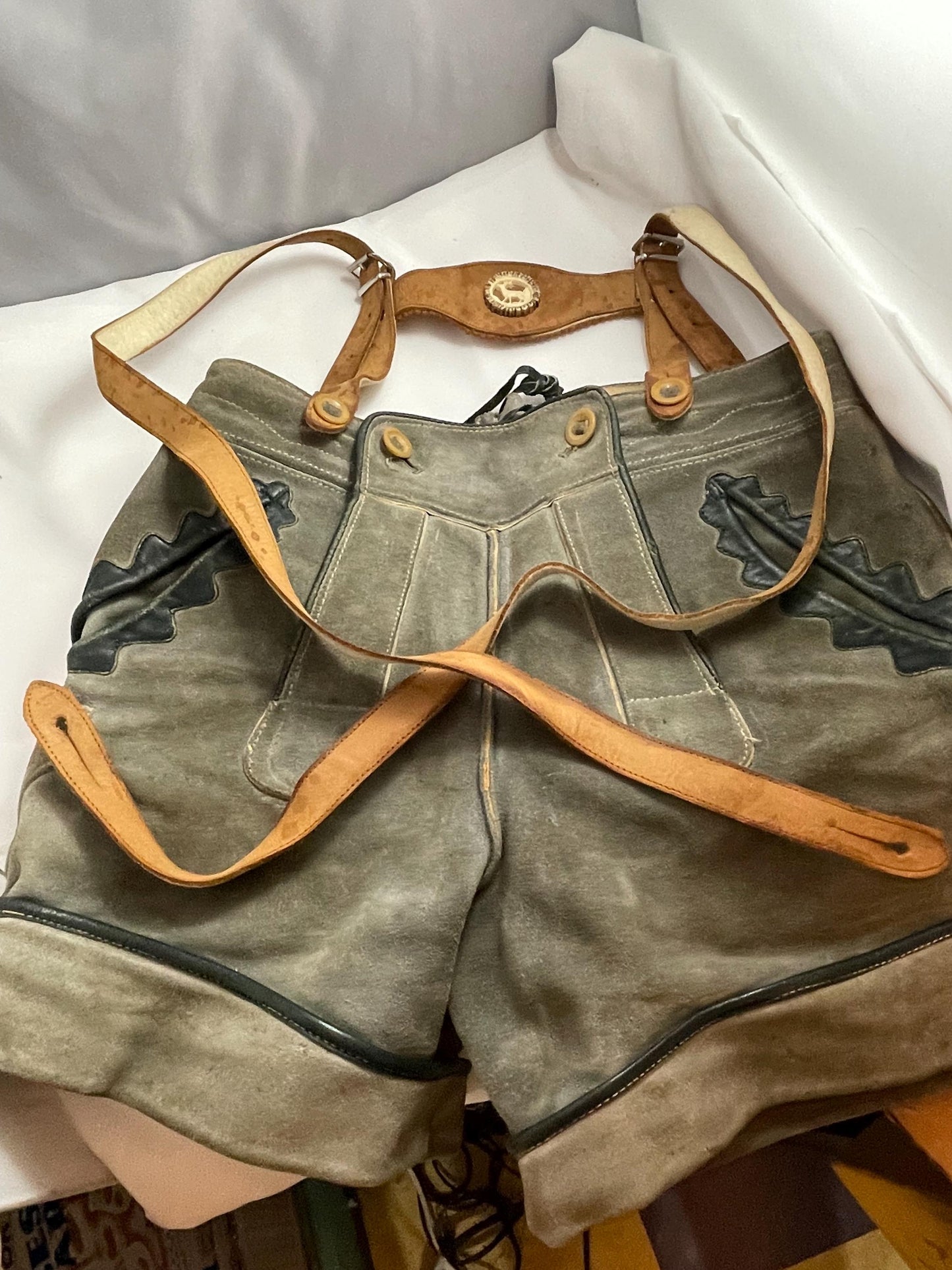 Vintage suede Lederhosen suspender shorts w/ 50’s-60’s Vintage Lederhosen Leather pants brace w/ zipper pocket and Deer Emblem.