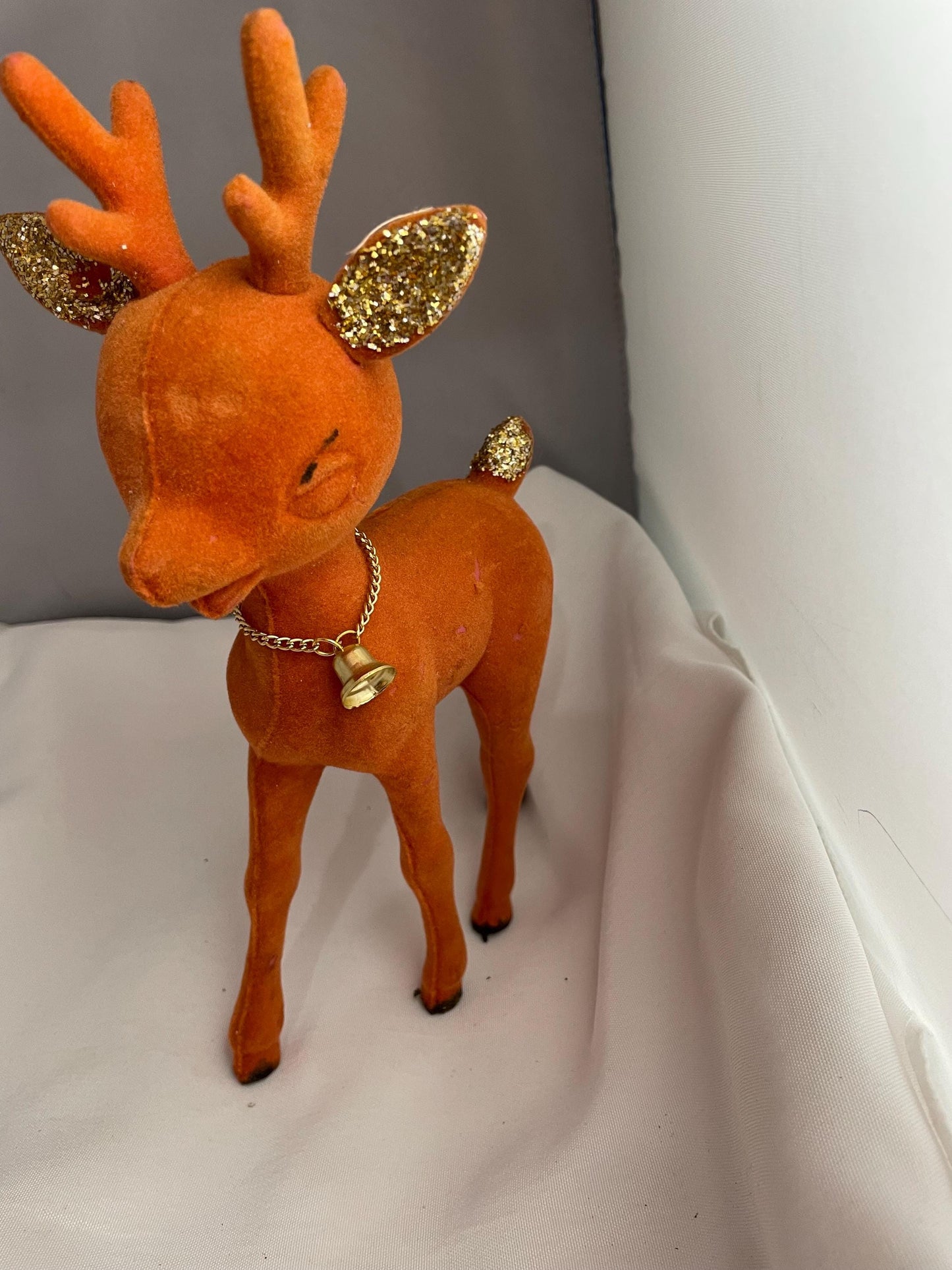 Vintage Flocked Plastic Rudolph Christmas decor.