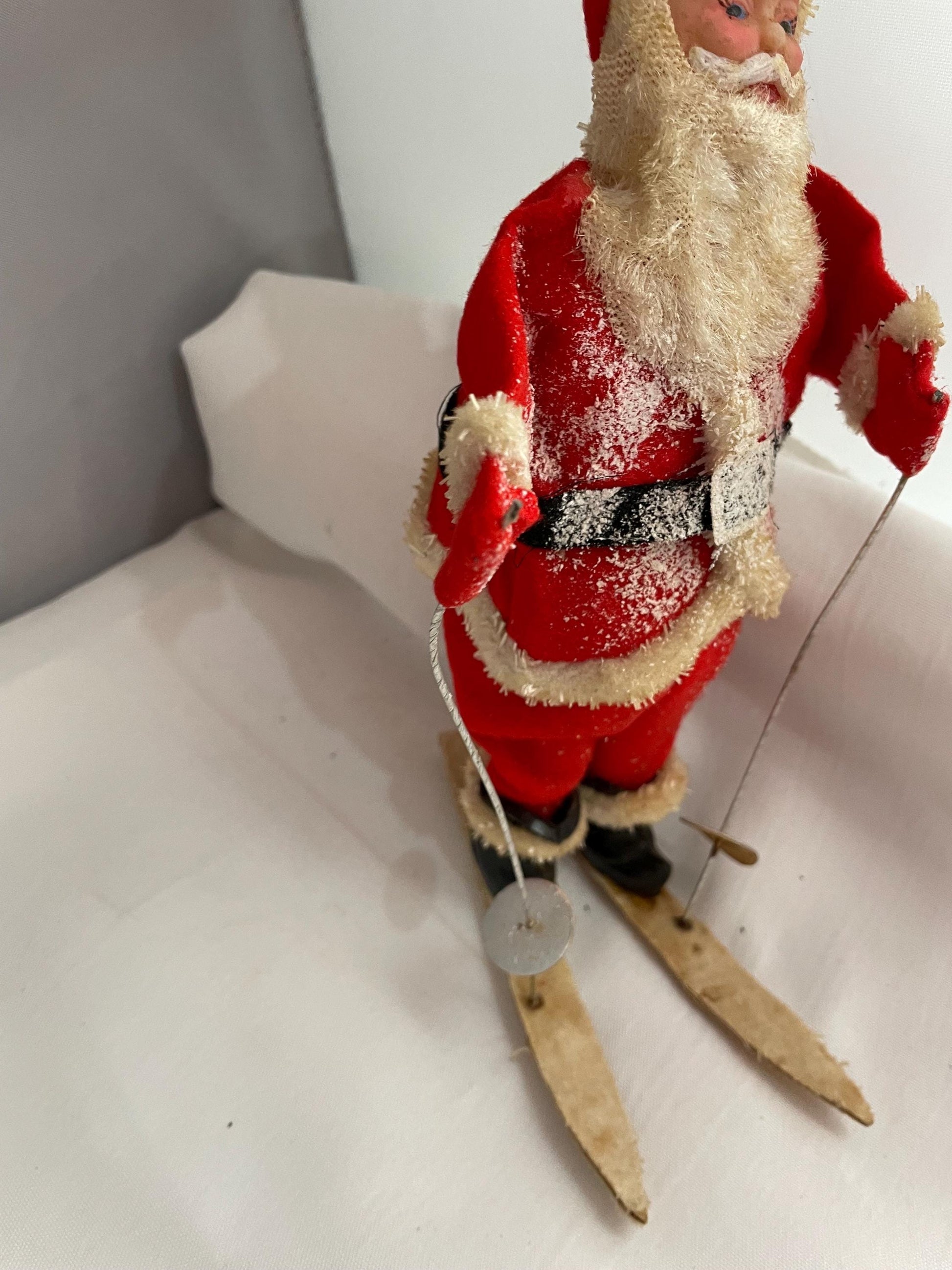 Vintage Christmas Santa Claus Skiing collectible decor.