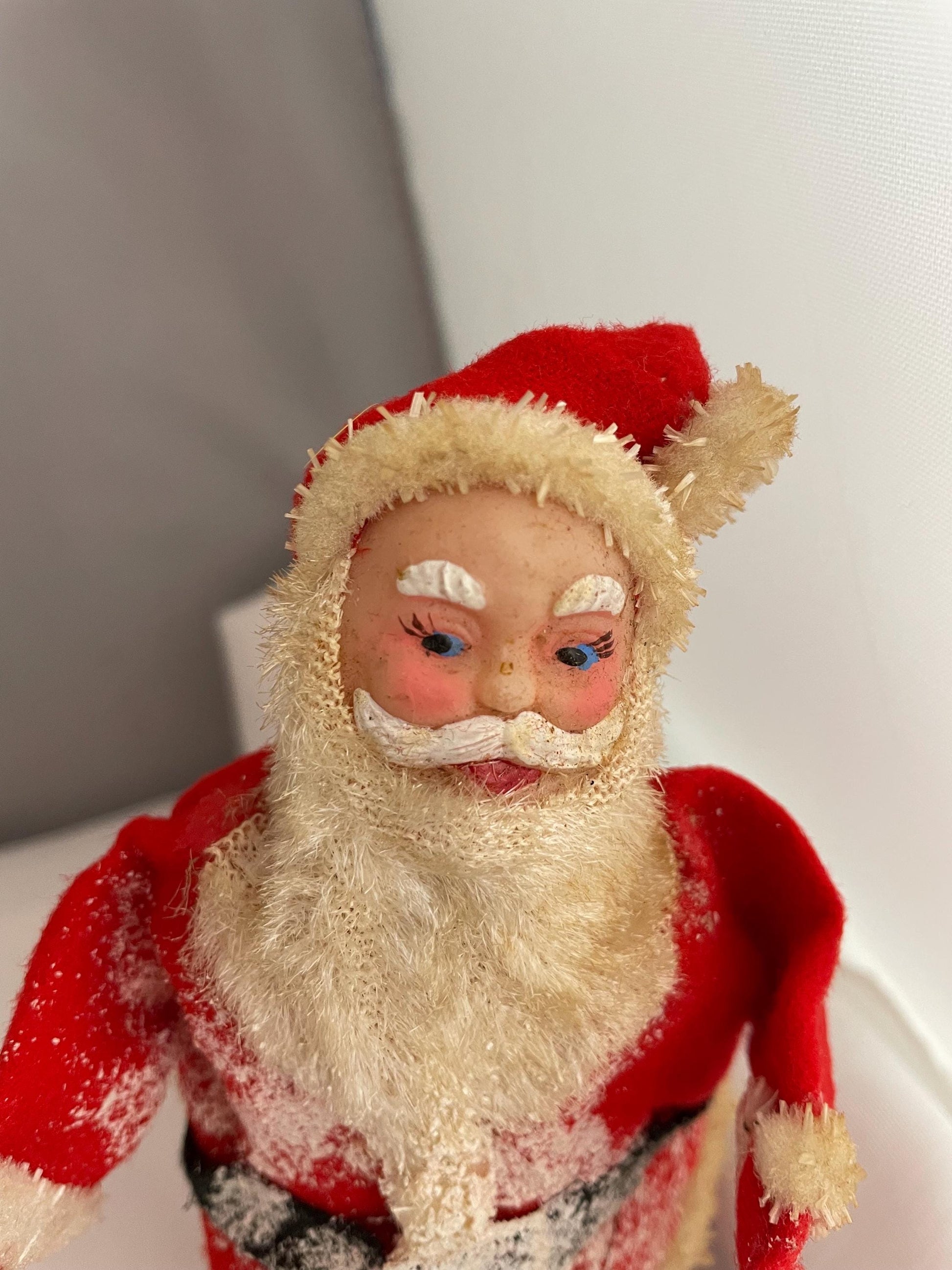 Vintage Christmas Santa Claus Skiing collectible decor.