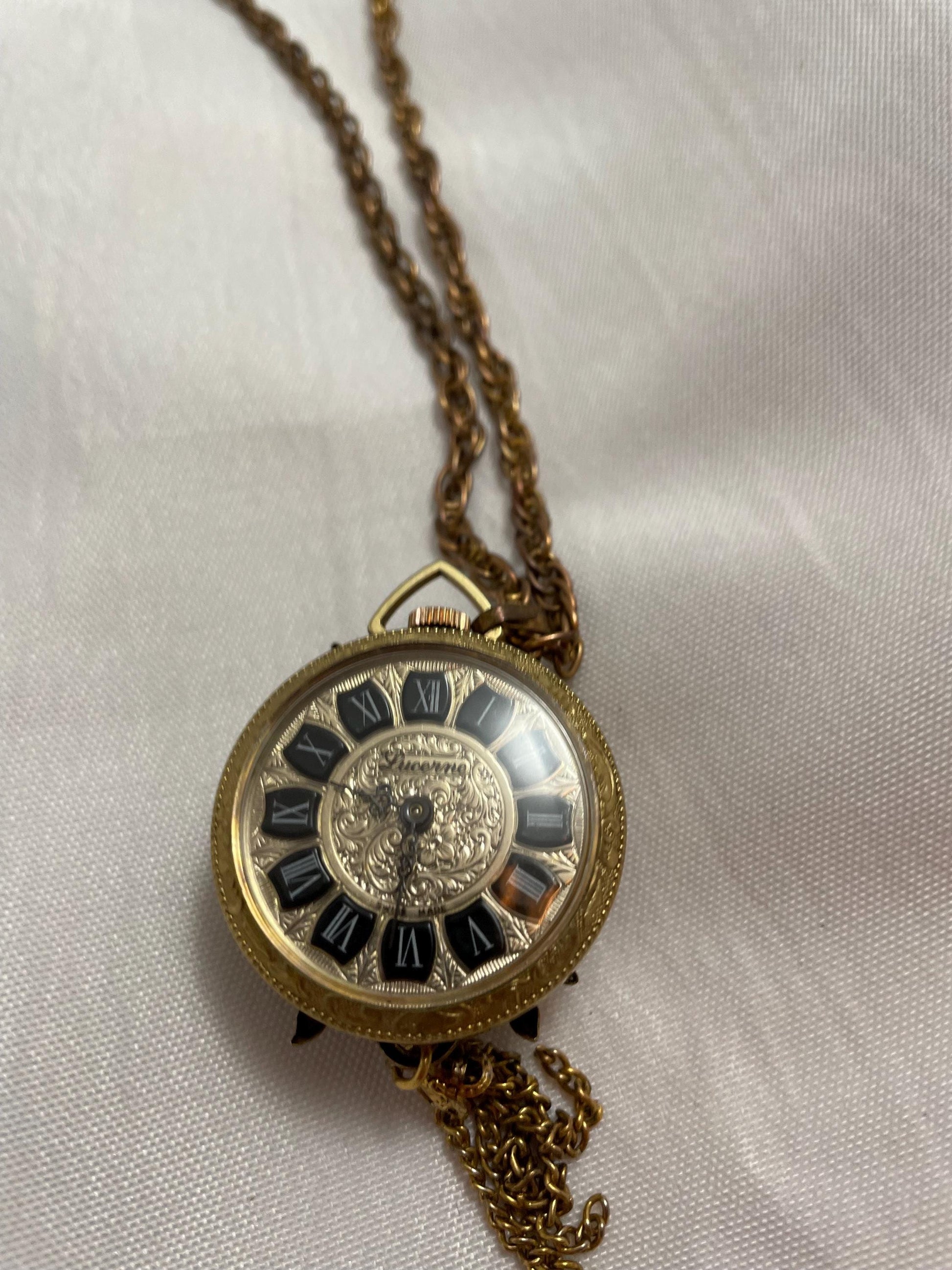 Vintage Lucerne Heritage Pendant Watch/Necklace Cameo look. In working condition.