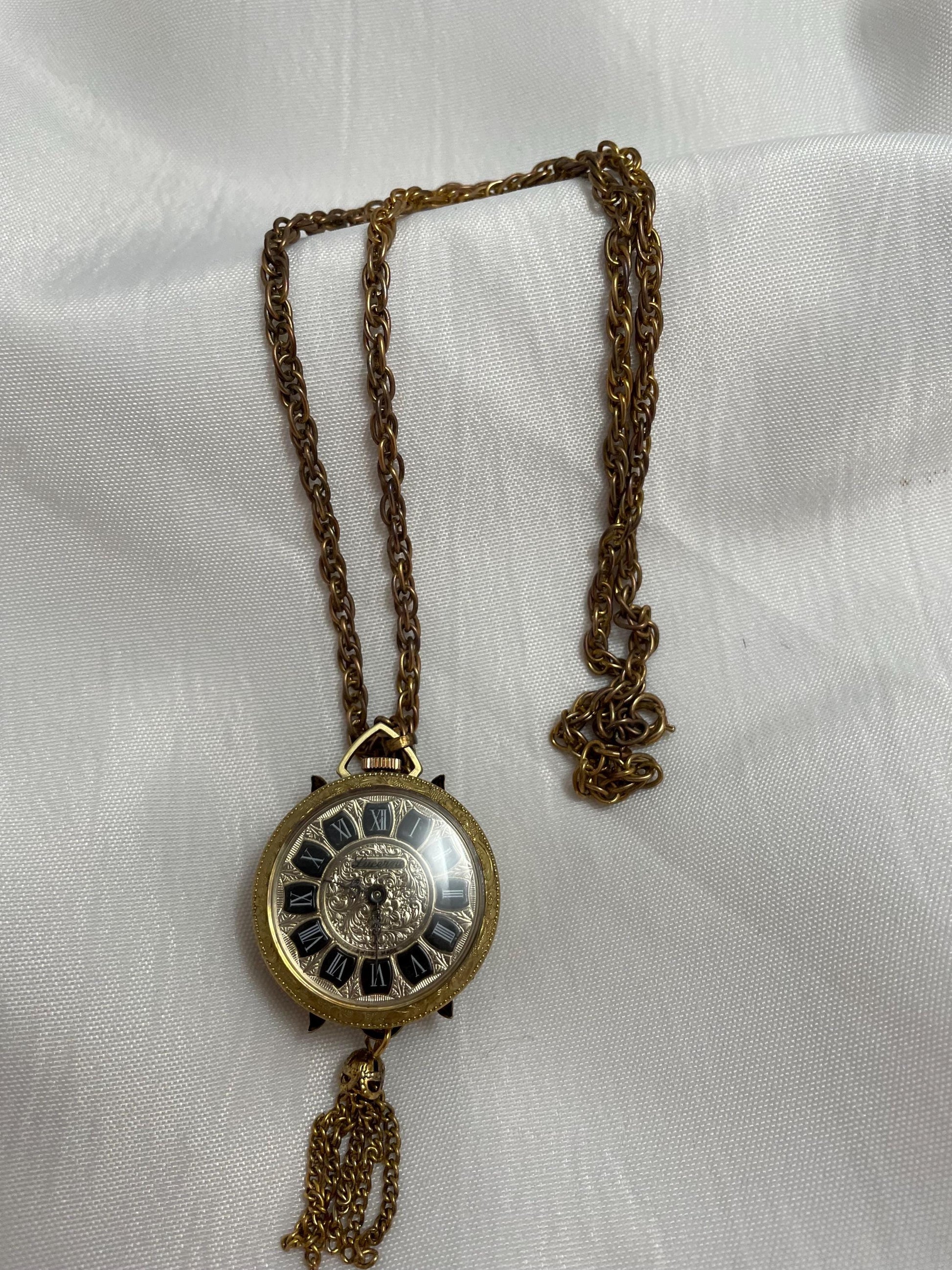 Vintage Lucerne Heritage Pendant Watch/Necklace Cameo look. In working condition.