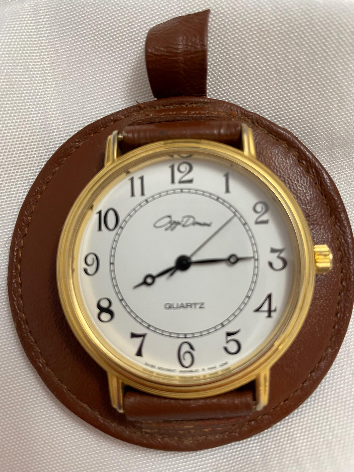 Vintage Oggi Domani Accessory wrist watch. gold. Genuine Cowhide Leather mounted. unable to determine if it works.
