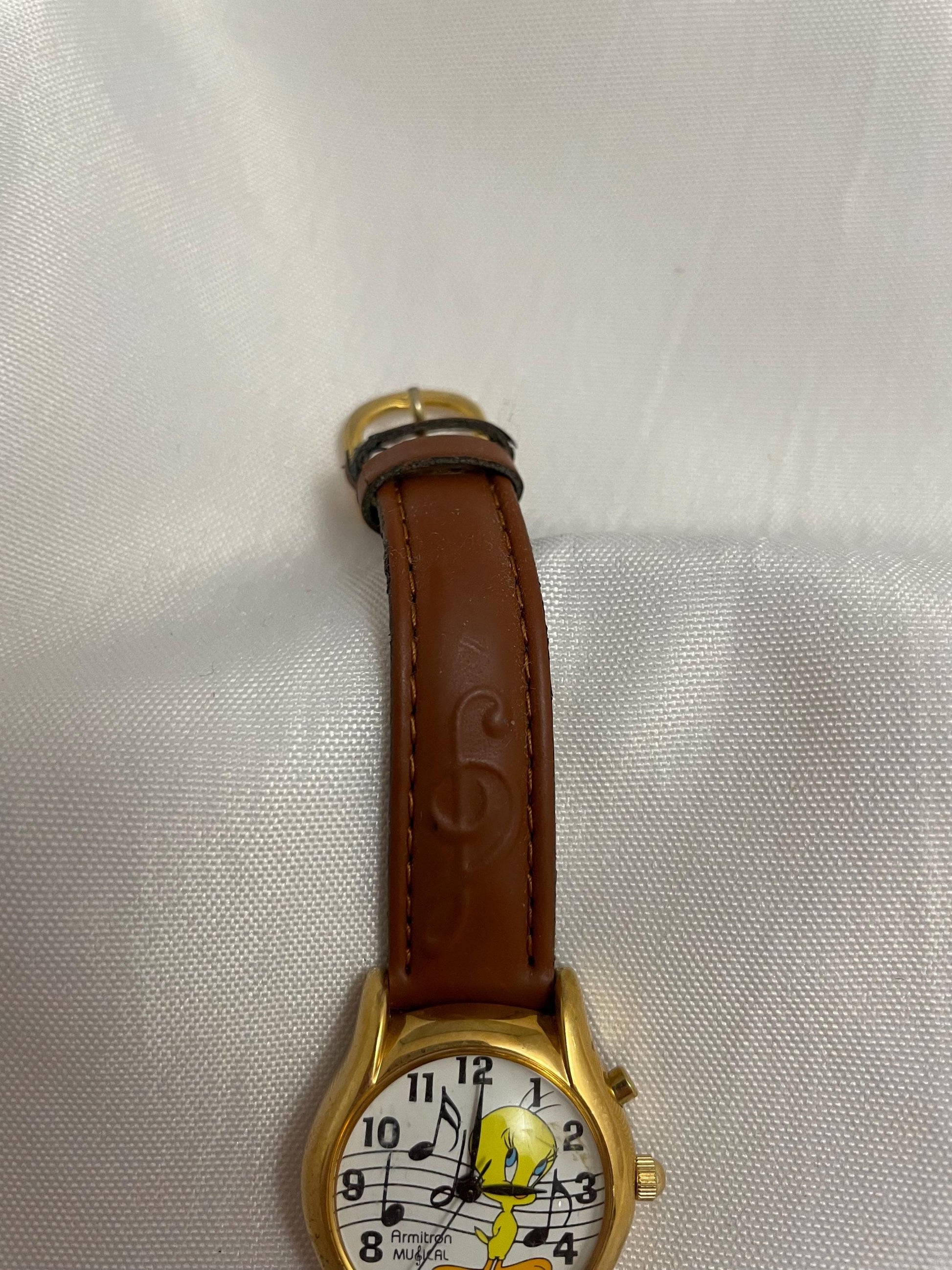 Vintage collectible Looney Tunes Tweety Bird Musical Looney Tunes Logo, leather wristband watch.