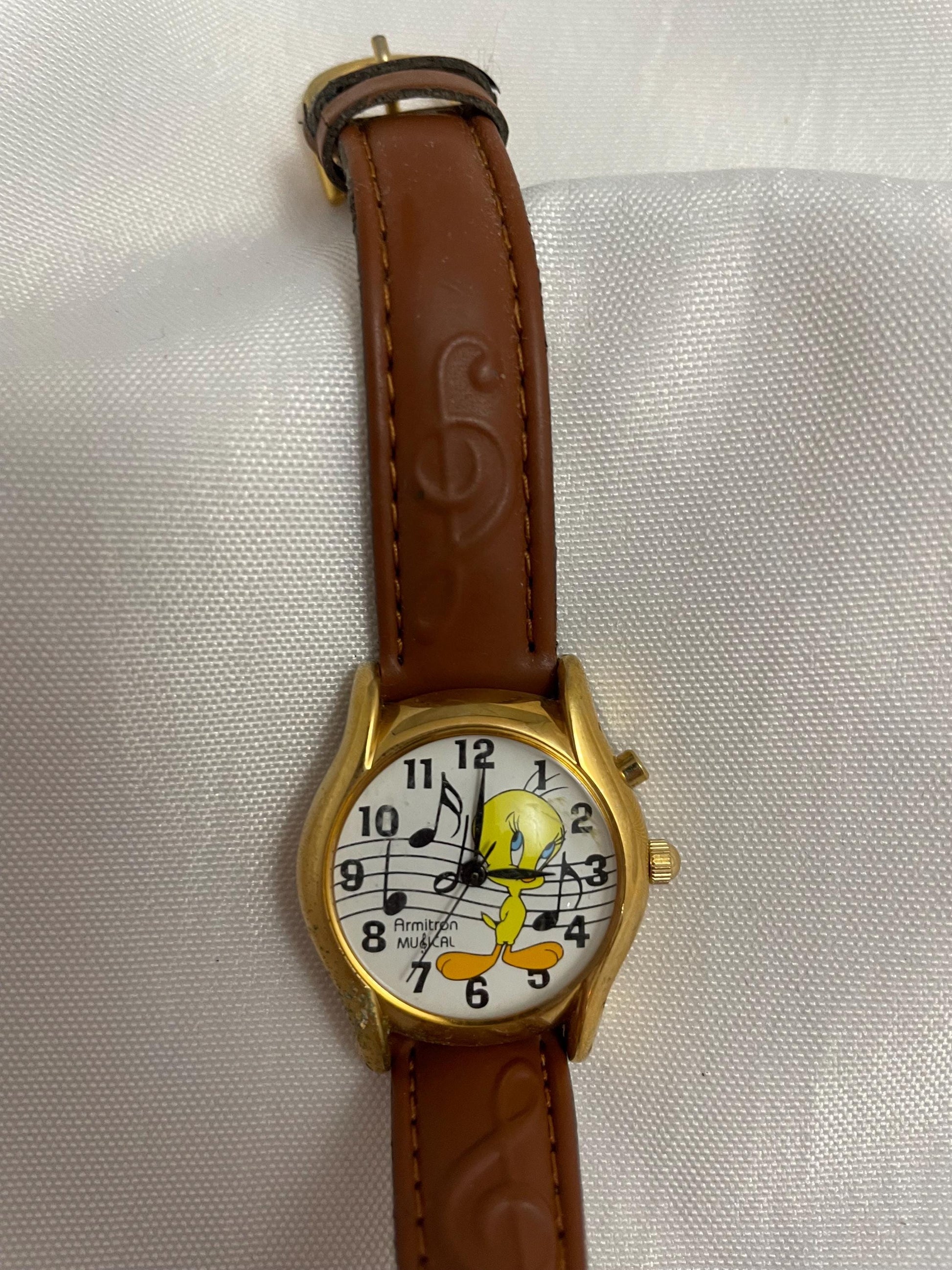 Vintage collectible Looney Tunes Tweety Bird Musical Looney Tunes Logo, leather wristband watch.