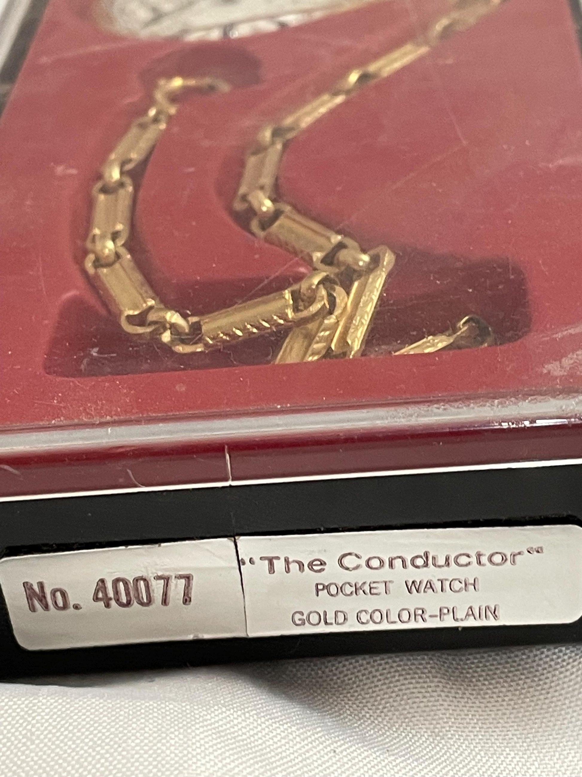 Vintage 1977 Westclox The Conductor Pocket watch W/chain.