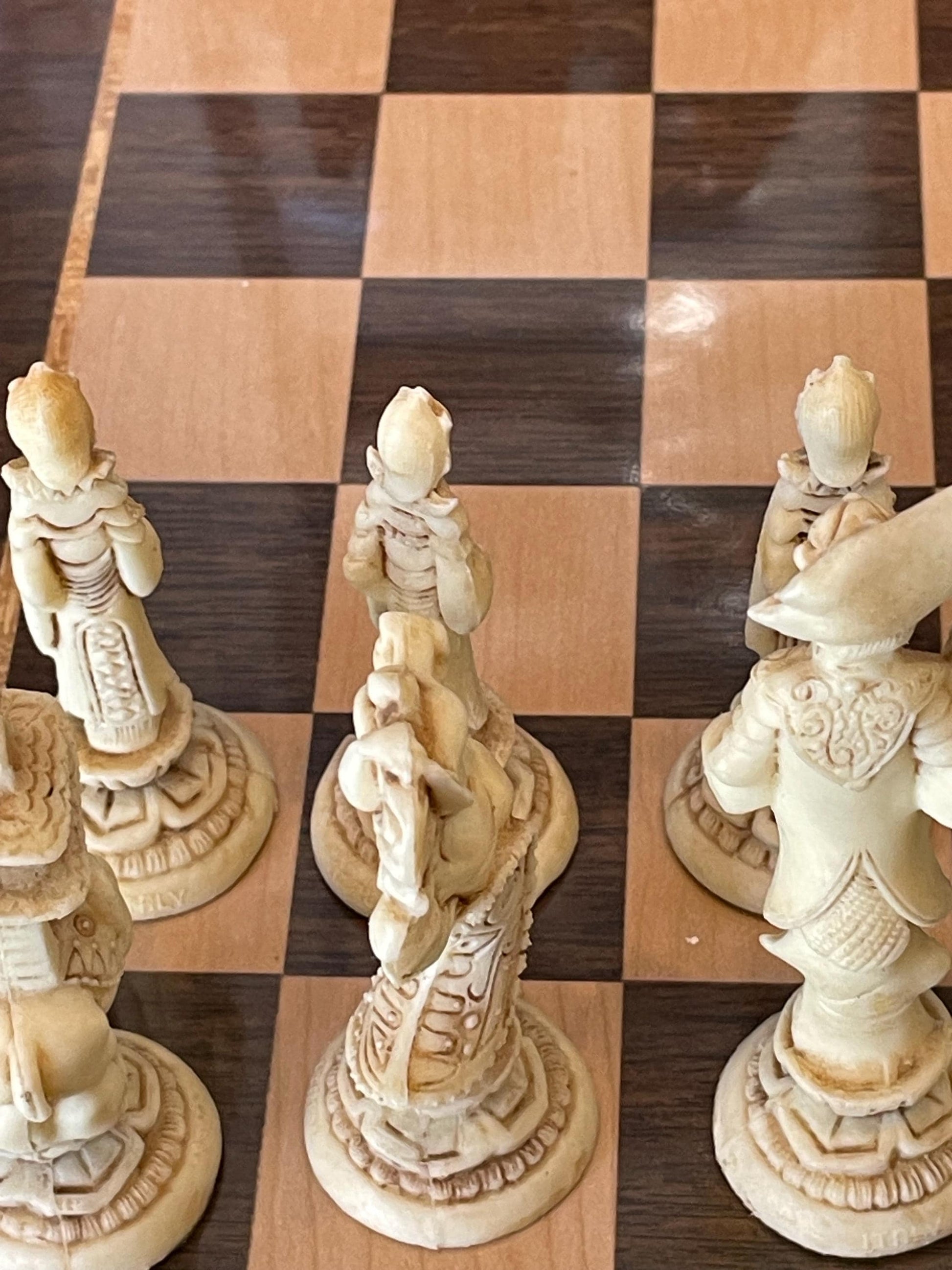 Vintage Chess Set w/ Board and Carrying case. 2 chess pieces need bottoms fixed but intacted .